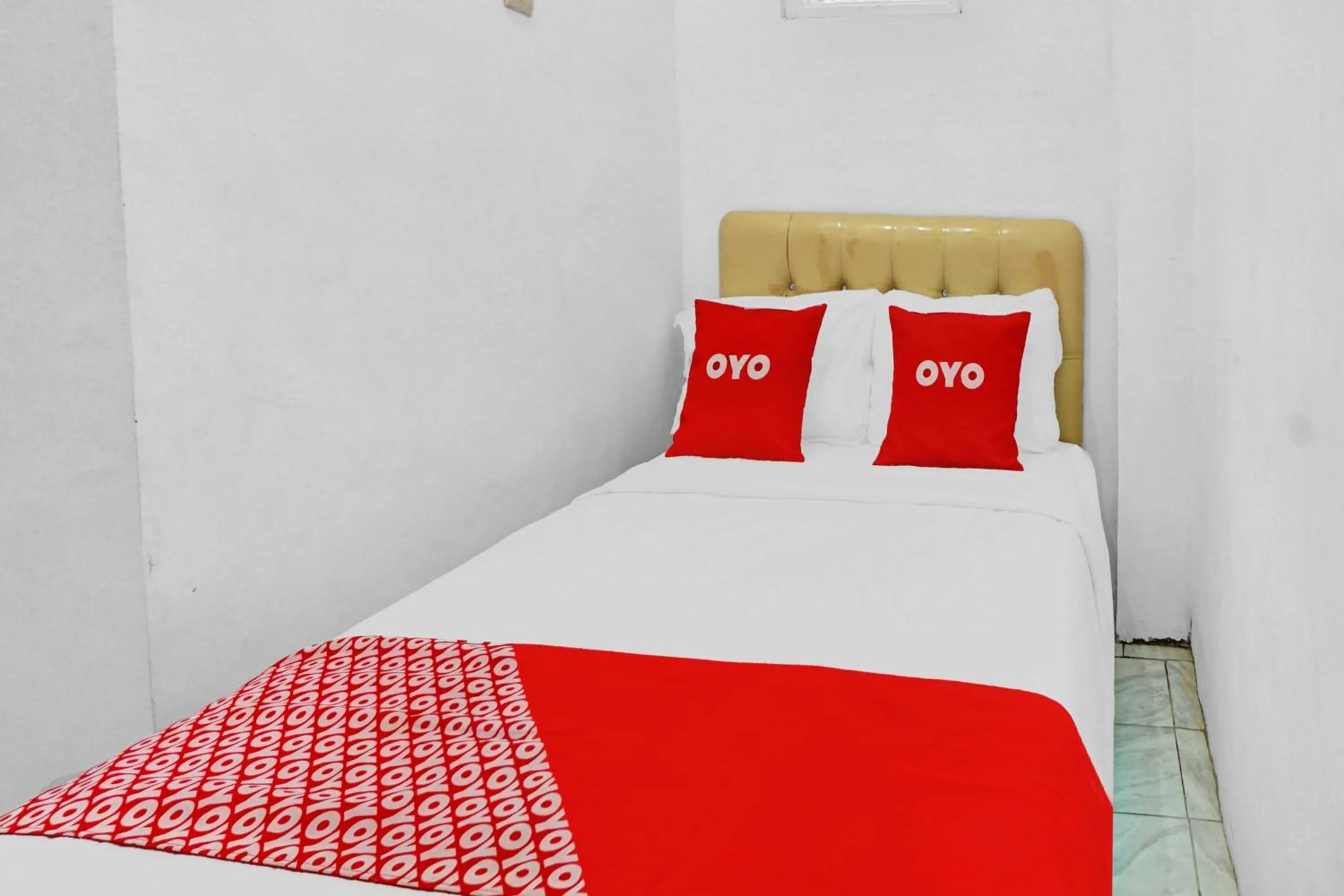 Bedroom in Hotel O Btc Guest House Syariah