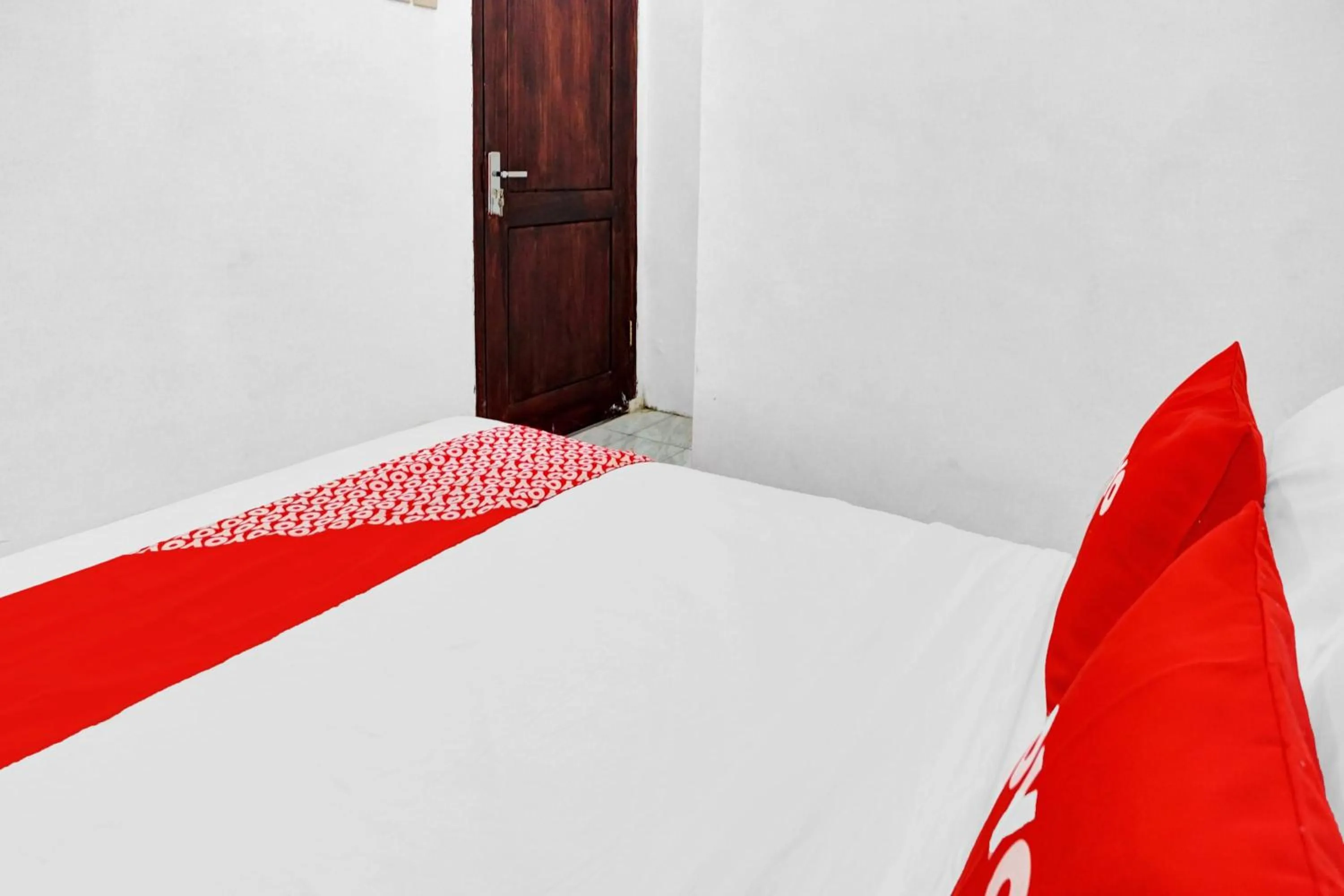 Bedroom in Hotel O Btc Guest House Syariah