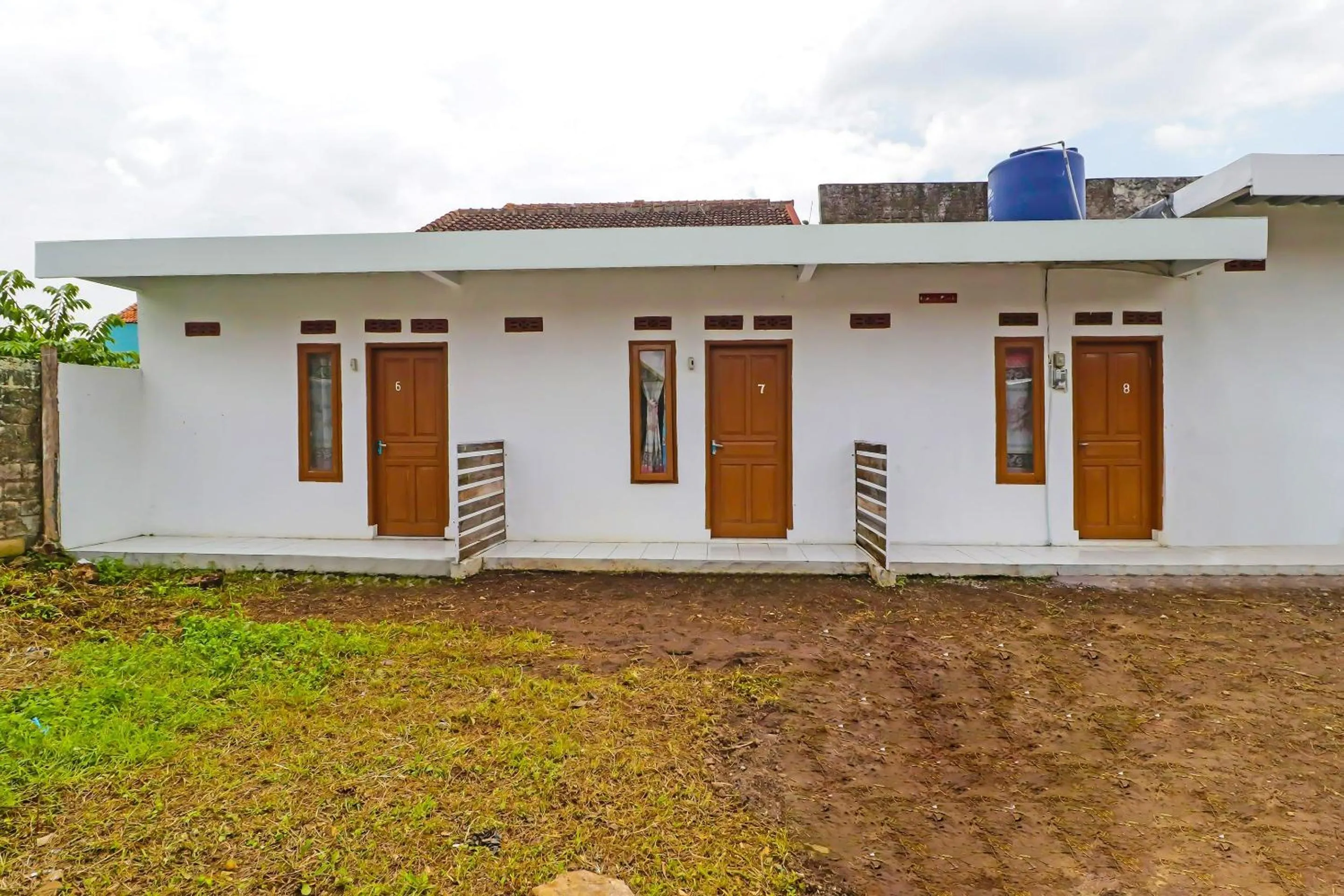 Lobby or reception in OYO 90809 Homestay Black Pink Merah Jambu Syariah