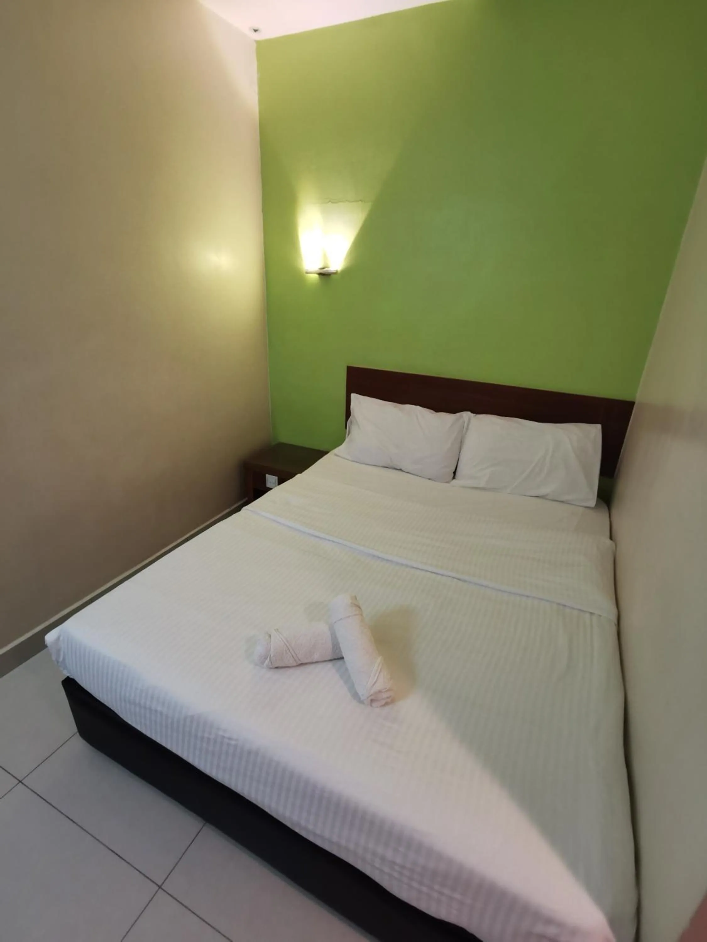 Bed in Sweet Star Hotel