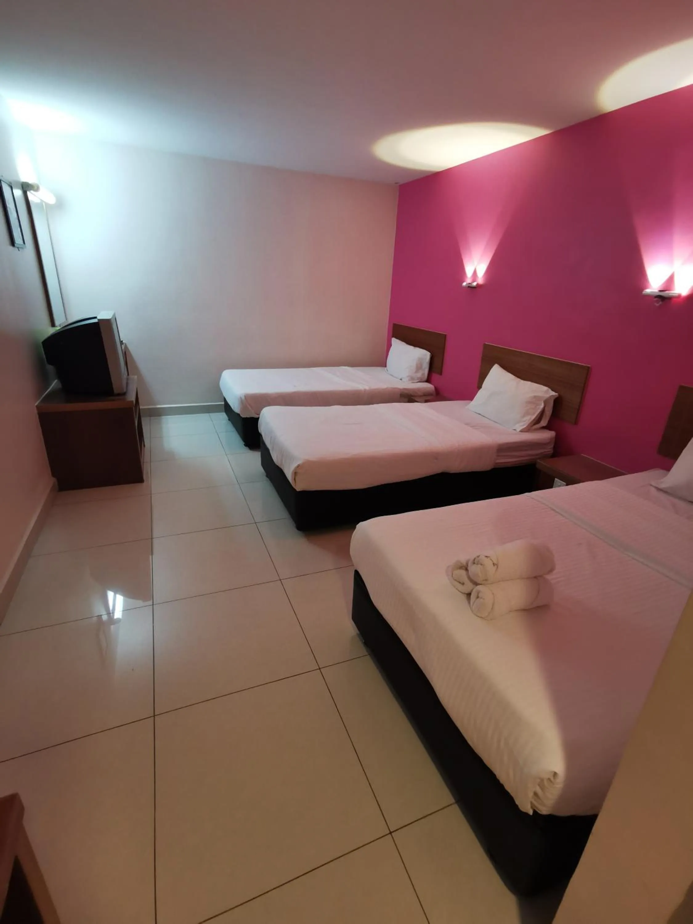 Bed in Sweet Star Hotel