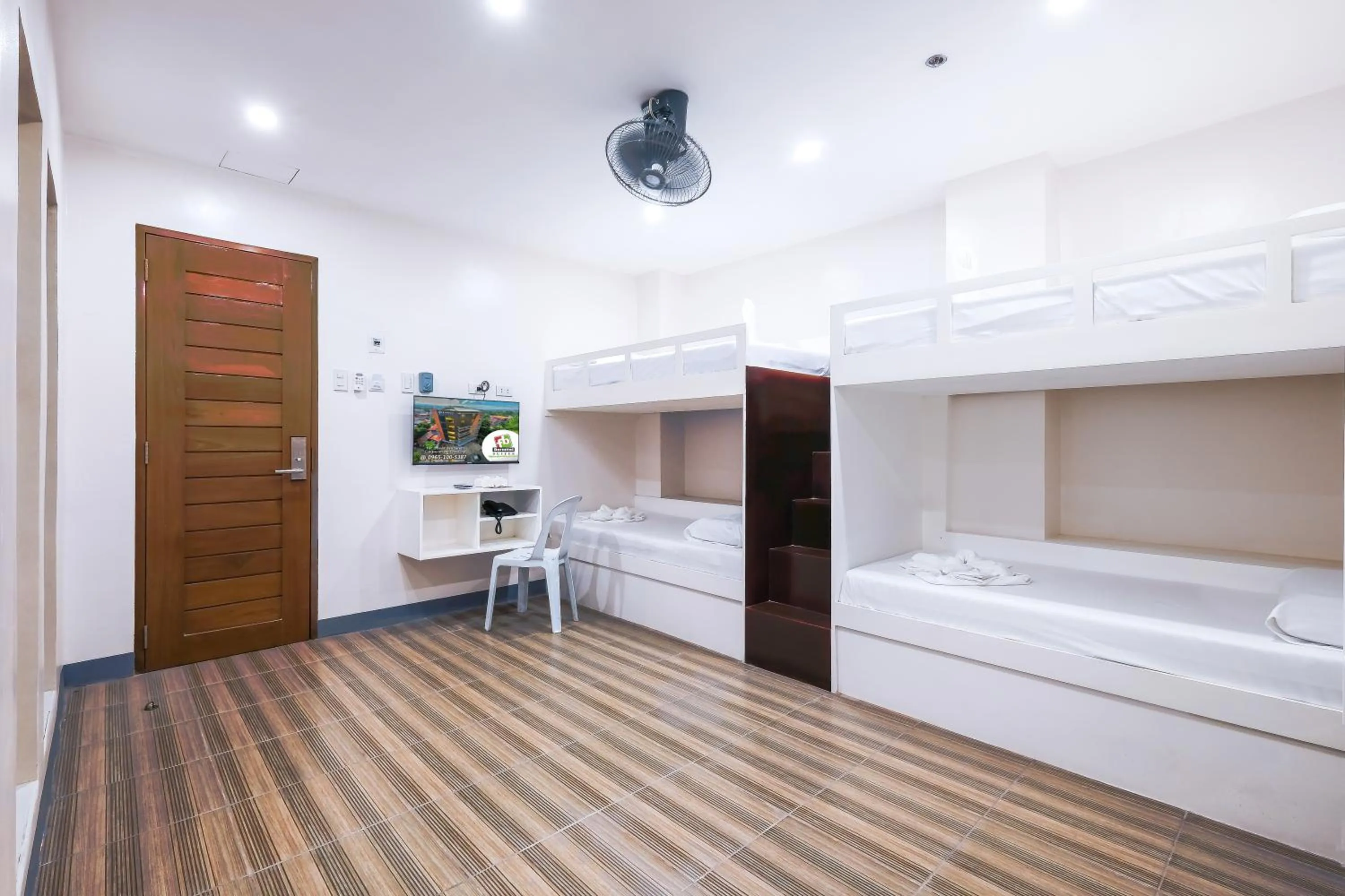 Photo of the whole room, Bed in FB DORMITEL SUITES