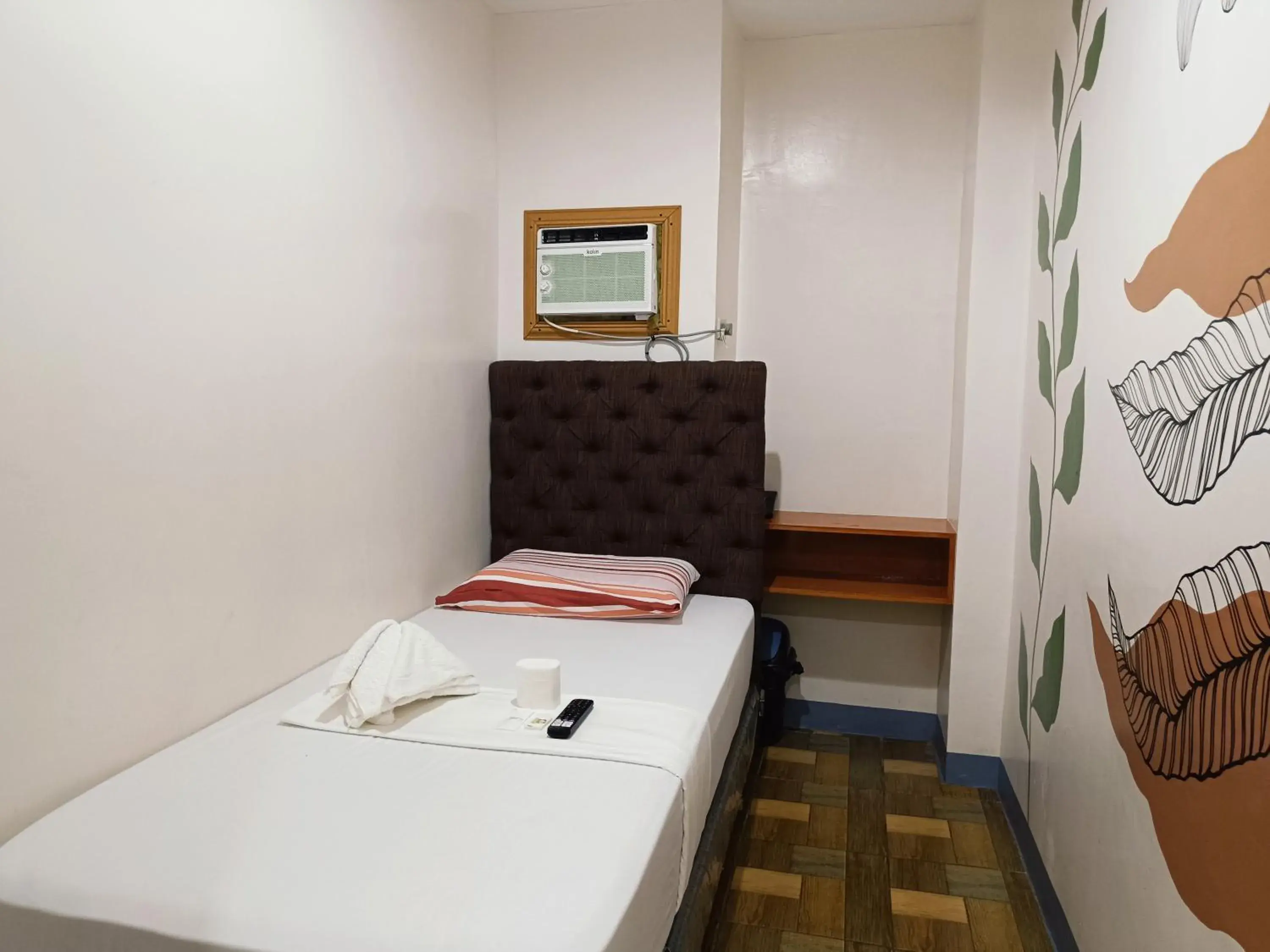 Bed in FB Dormitel Suites Bed in FB Dormitel Suites