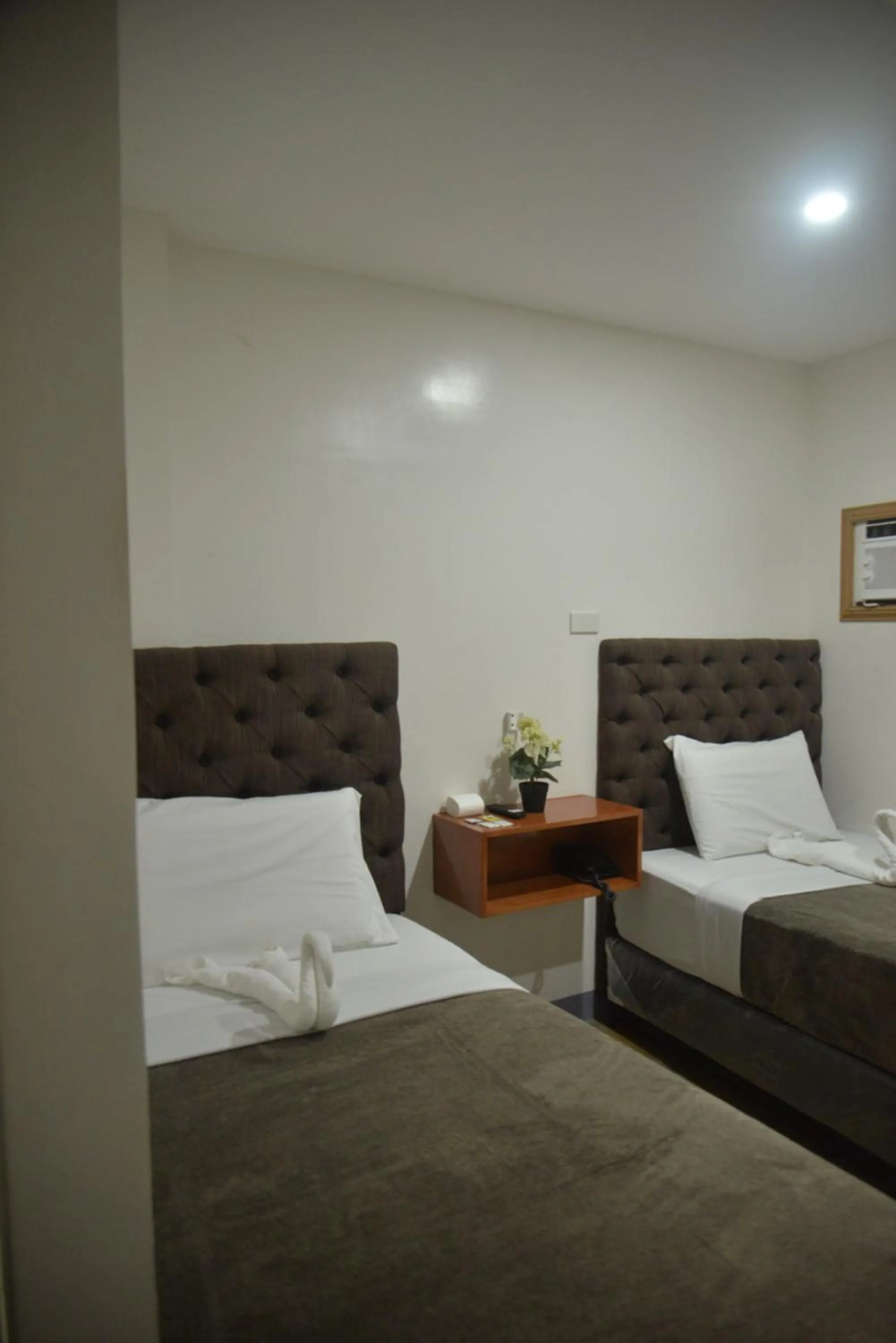 Bedroom, Bed in FB DORMITEL SUITES