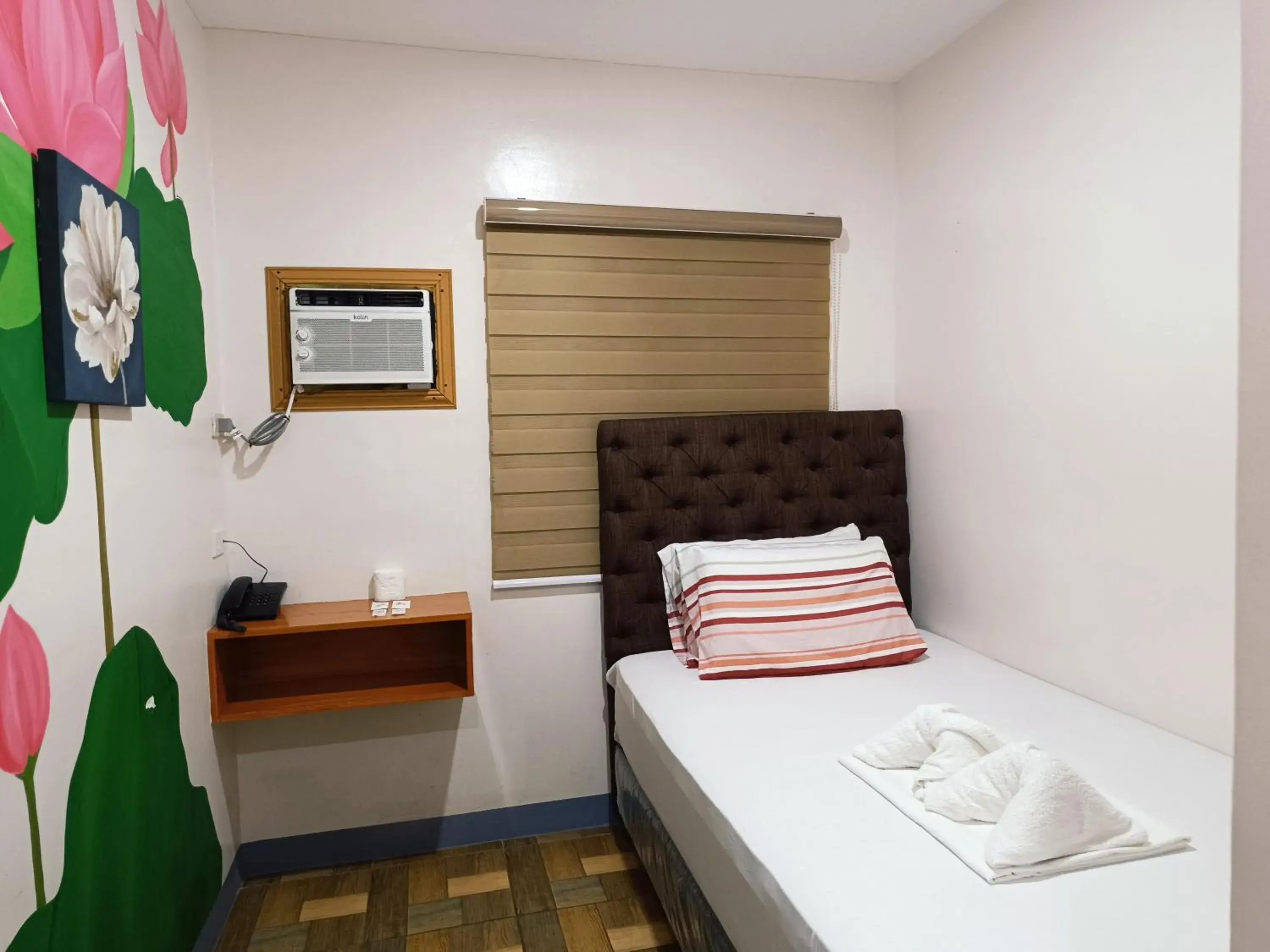 Bed in FB Dormitel Suites Bed in FB Dormitel Suites