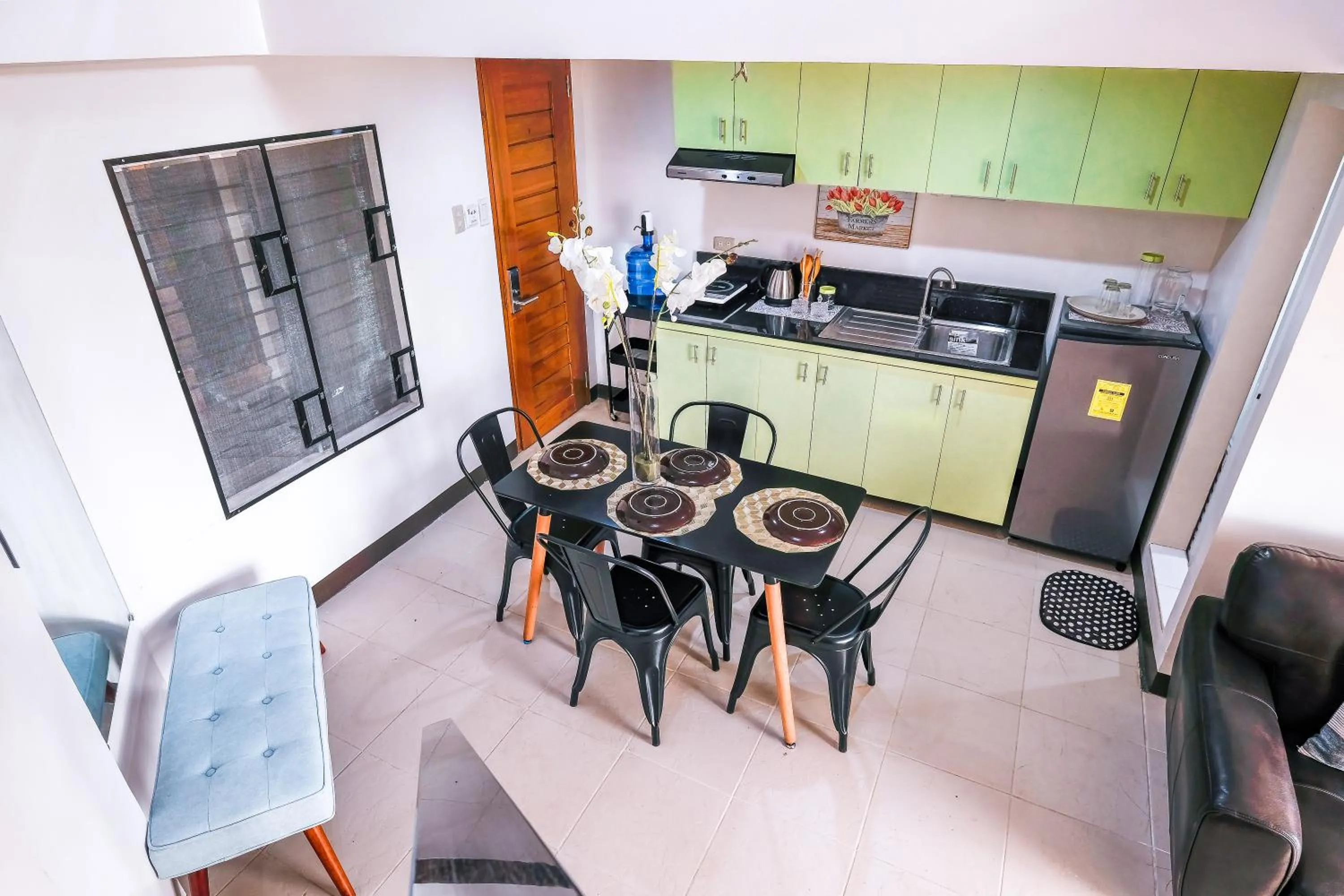 Dining area in FB DORMITEL SUITES