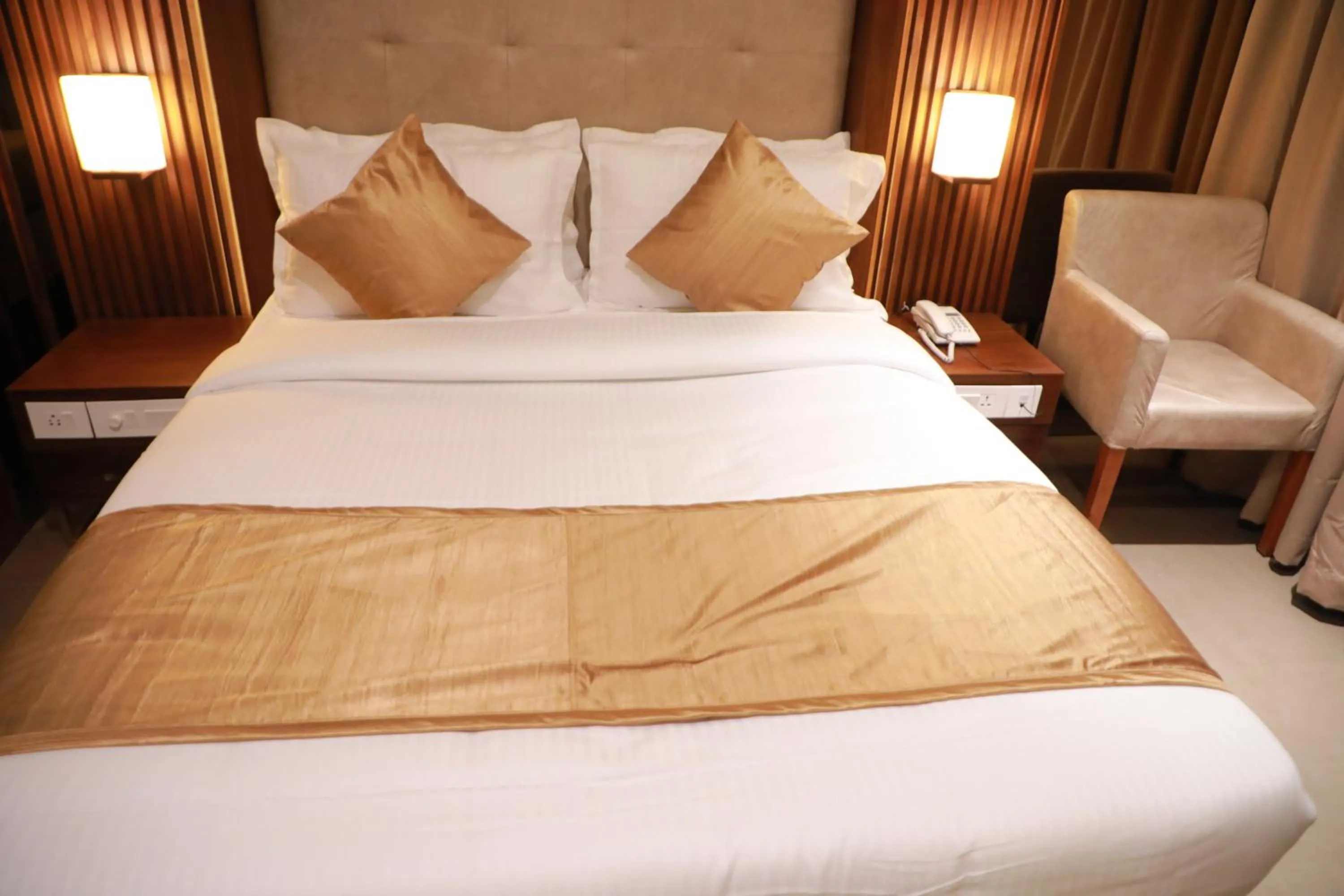 Bed in Magnet Hotel