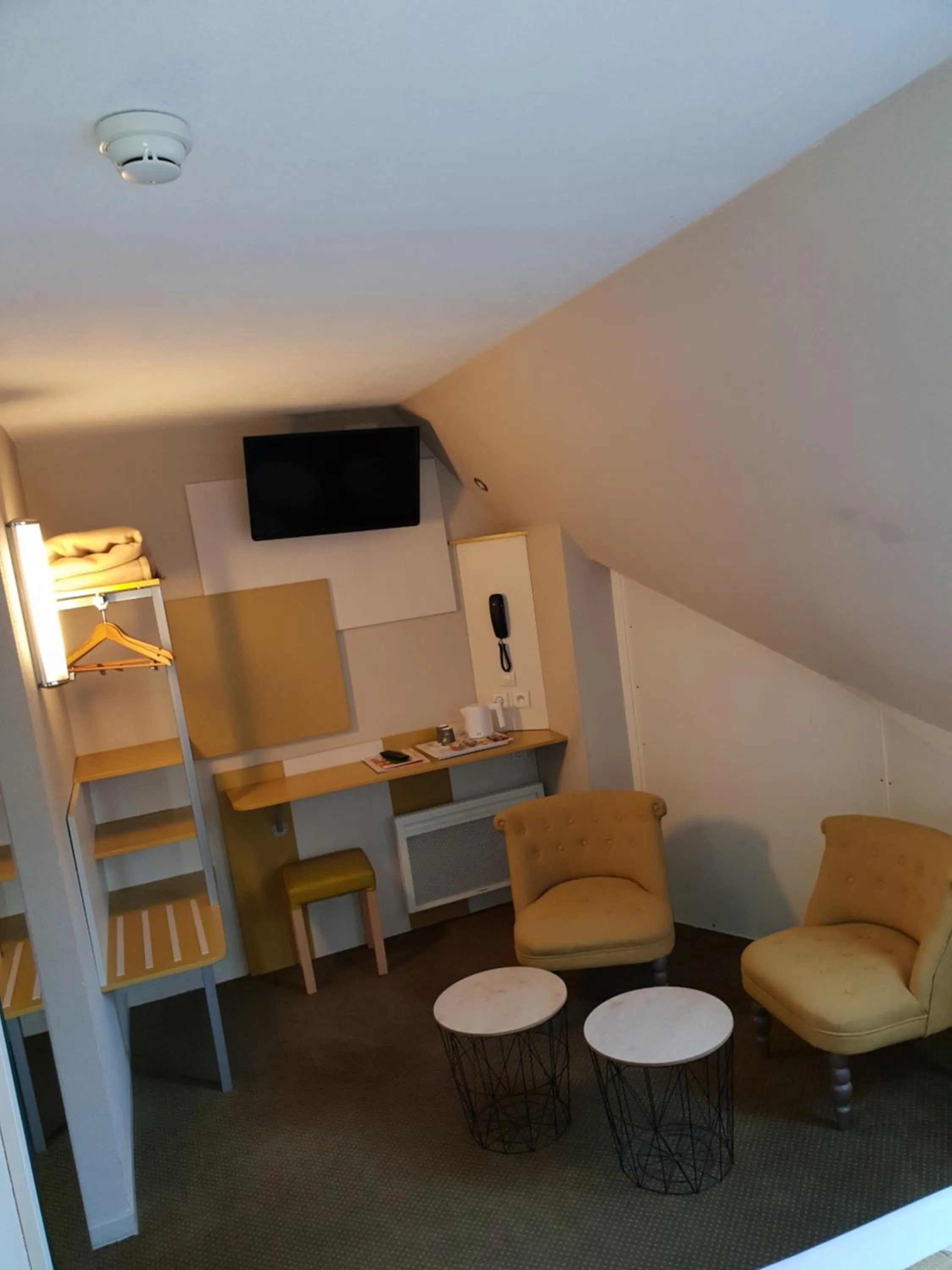 Seating area in Hôtel REVOTEL Nancy Centre Gare et Congrès