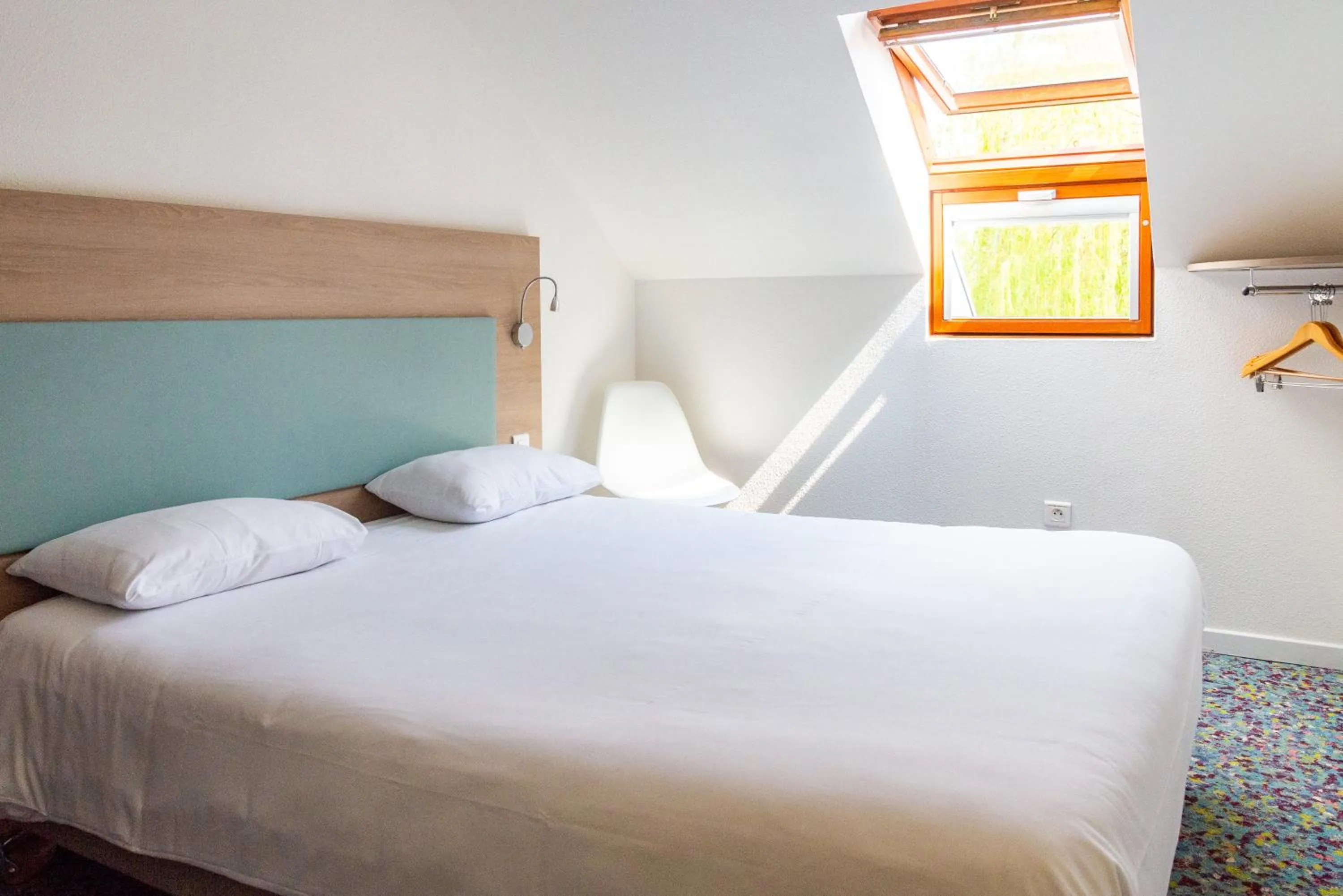 Bedroom, Bed in Hôtel REVOTEL Nancy Centre Gare et Congrès