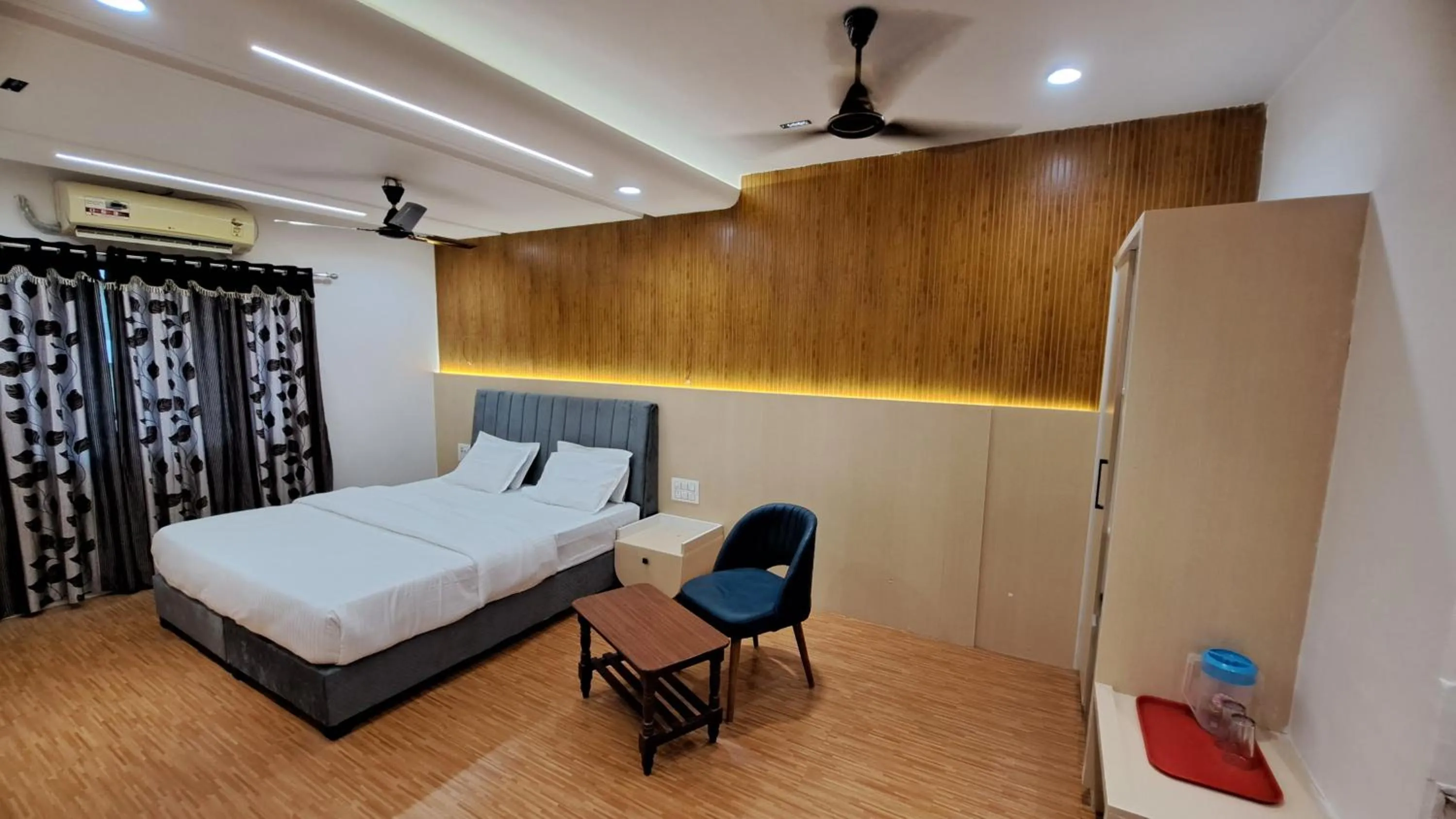 Bed in Hotel Dhruv Palace