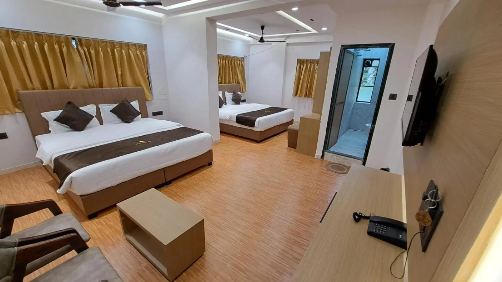 Bed in Hotel Dhruv Palace