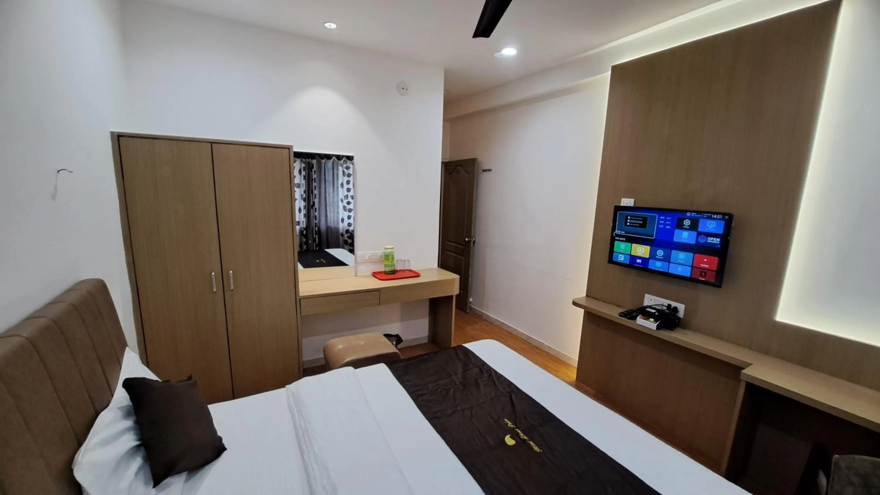 Bed in Hotel Dhruv Palace