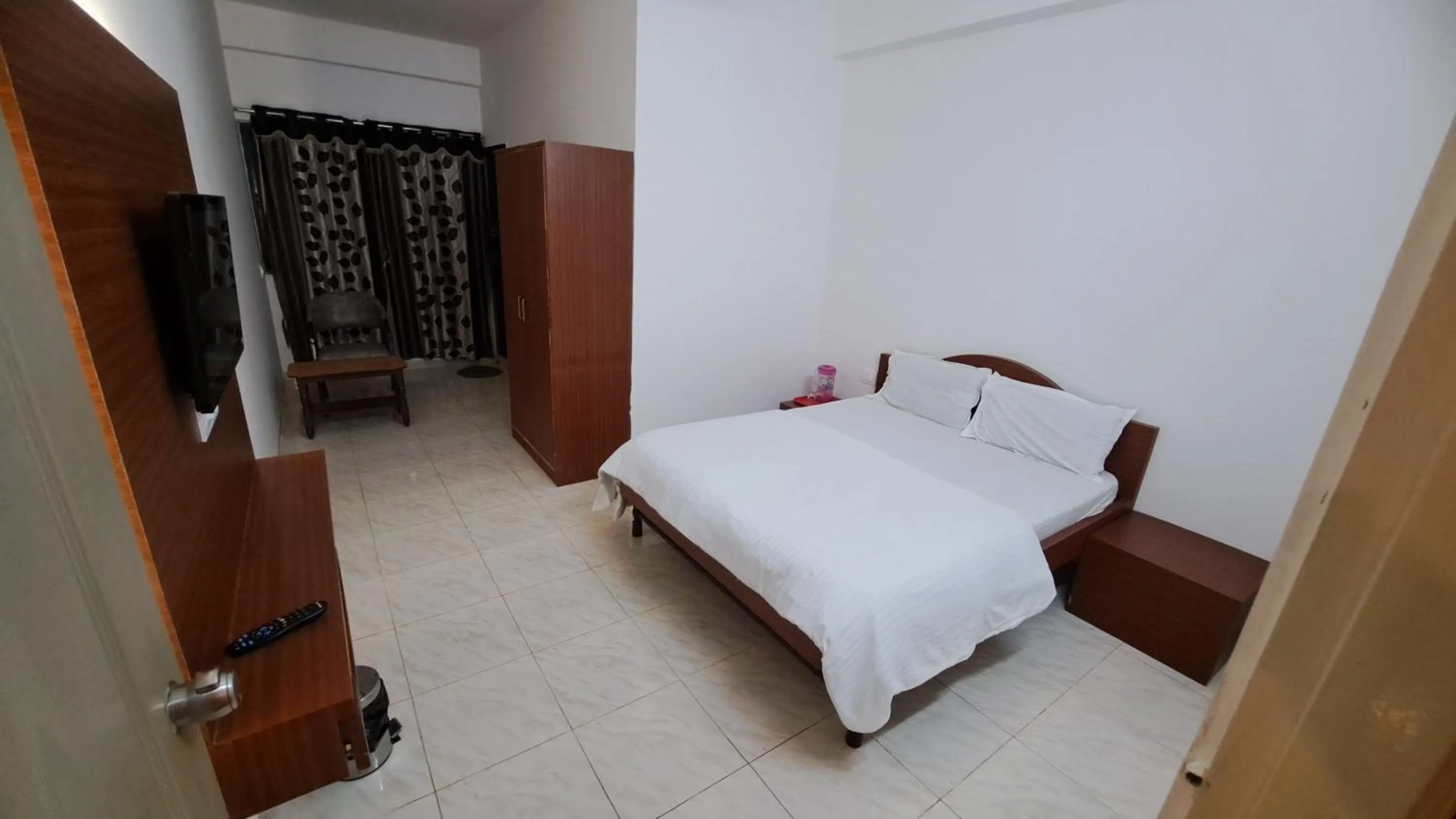 Bed in Hotel Dhruv Palace