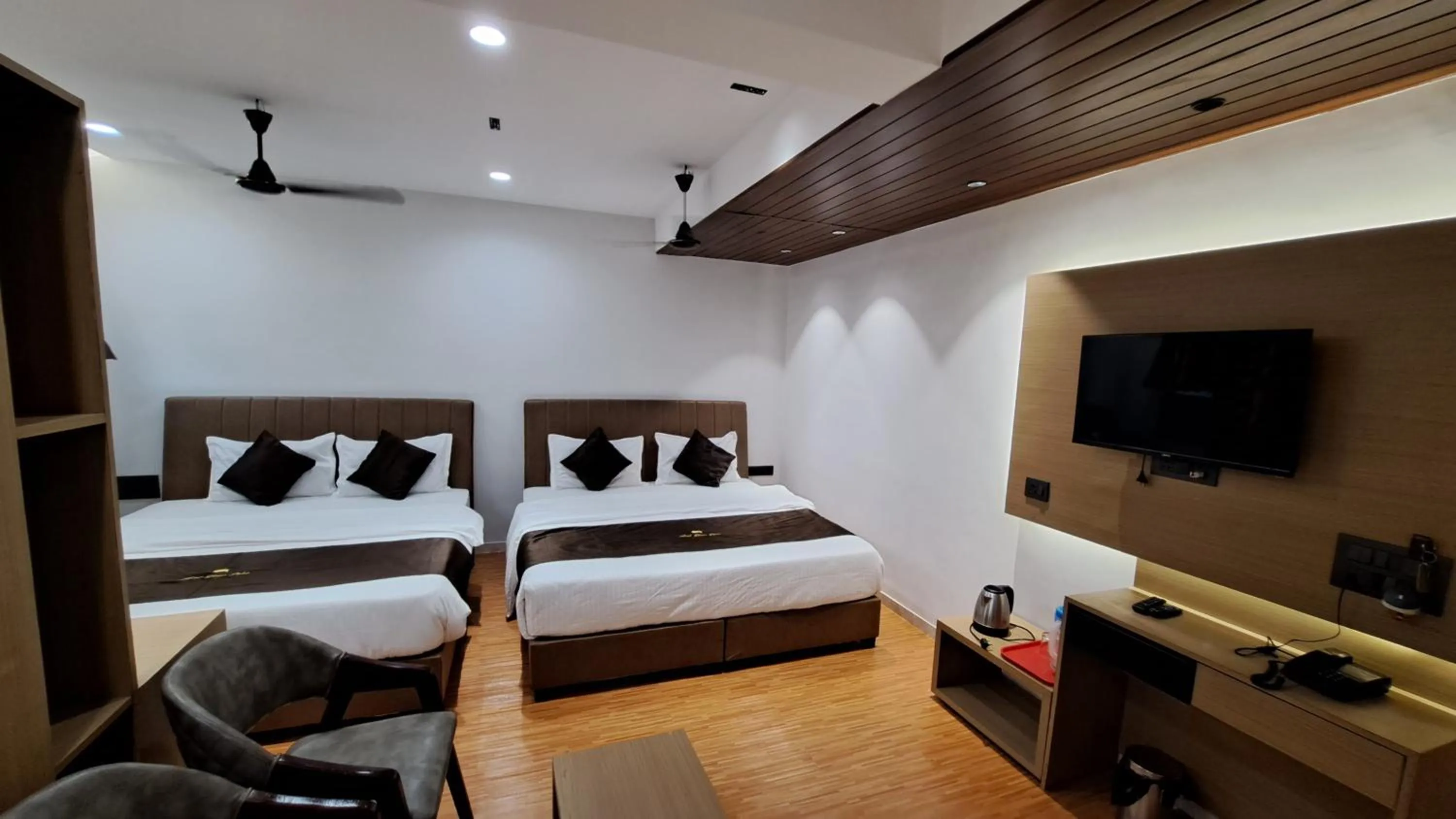 Bed in Hotel Dhruv Palace