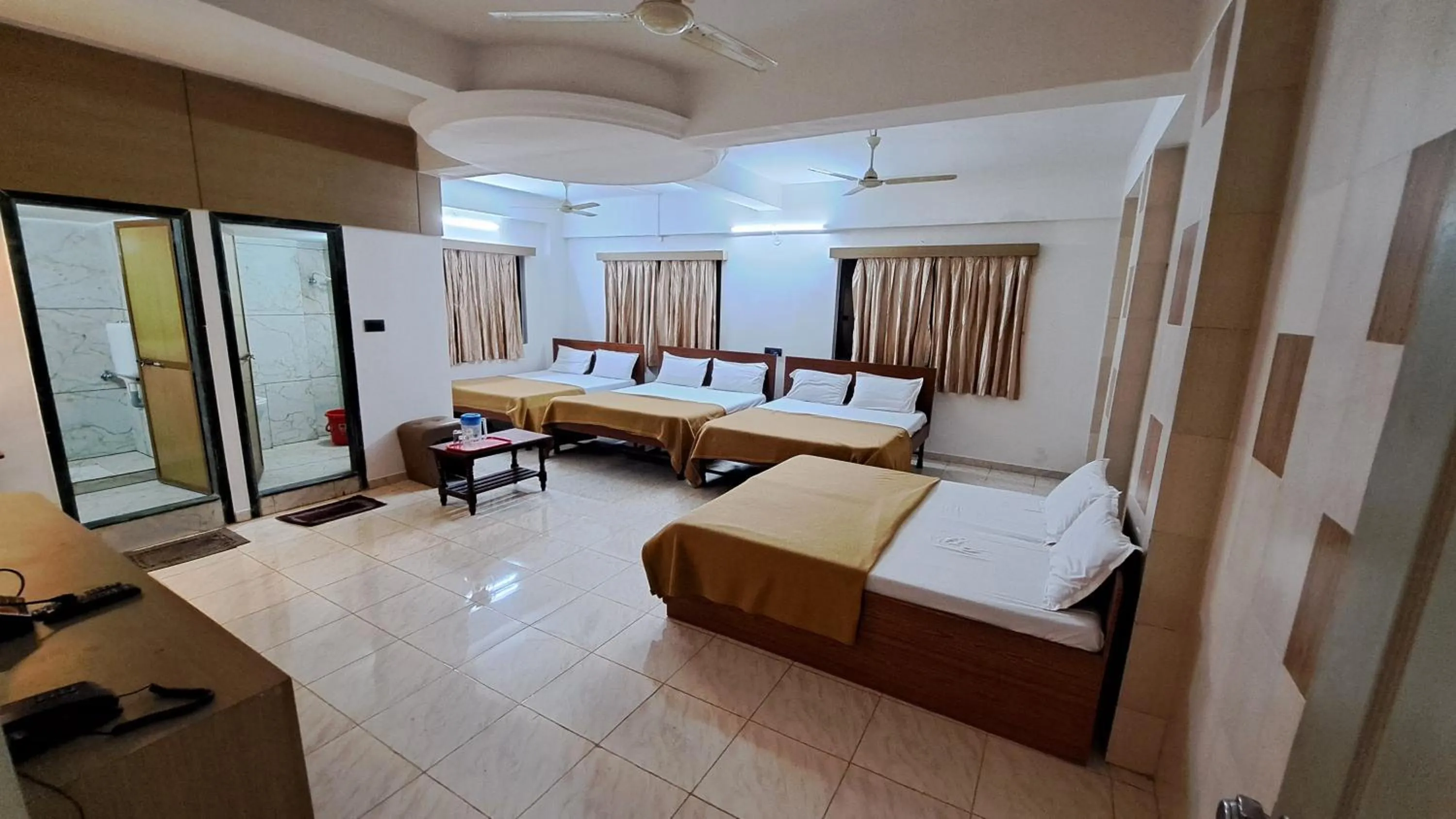 Bed in Hotel Dhruv Palace