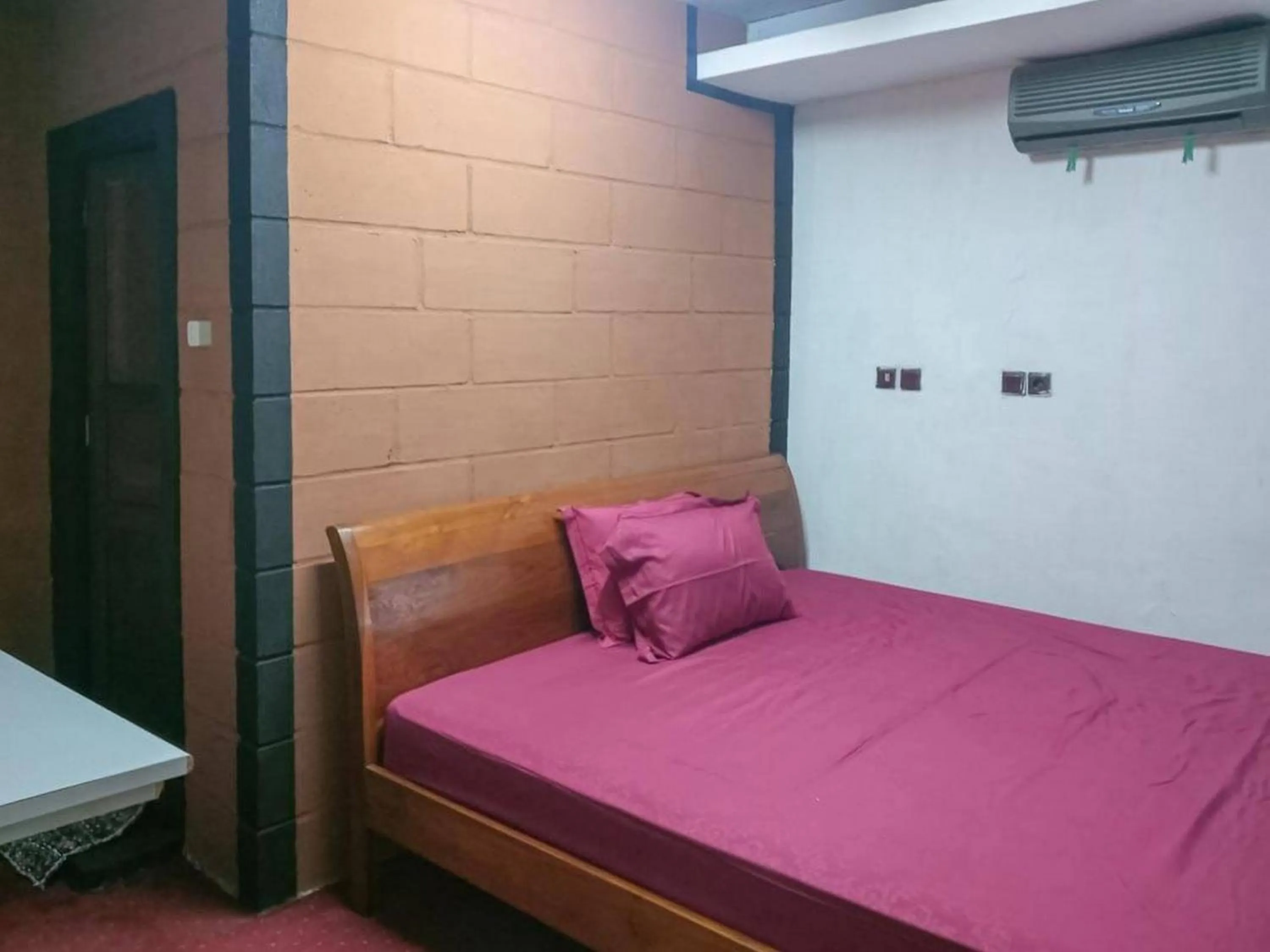 Bedroom, Bed in Rocky Guest House Syariah Mitra RedDoorz