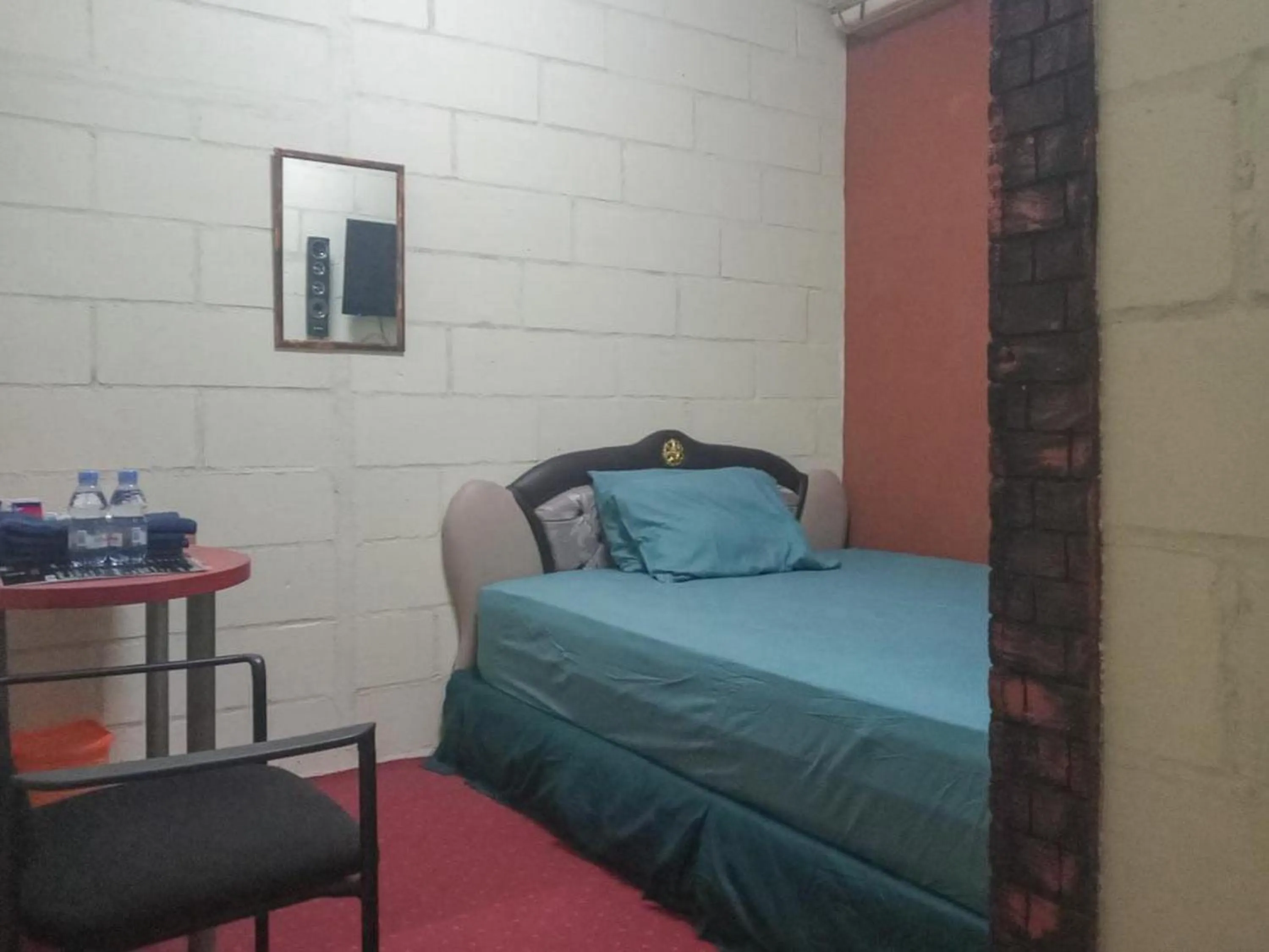 Bedroom, Bed in Rocky Guest House Syariah Mitra RedDoorz