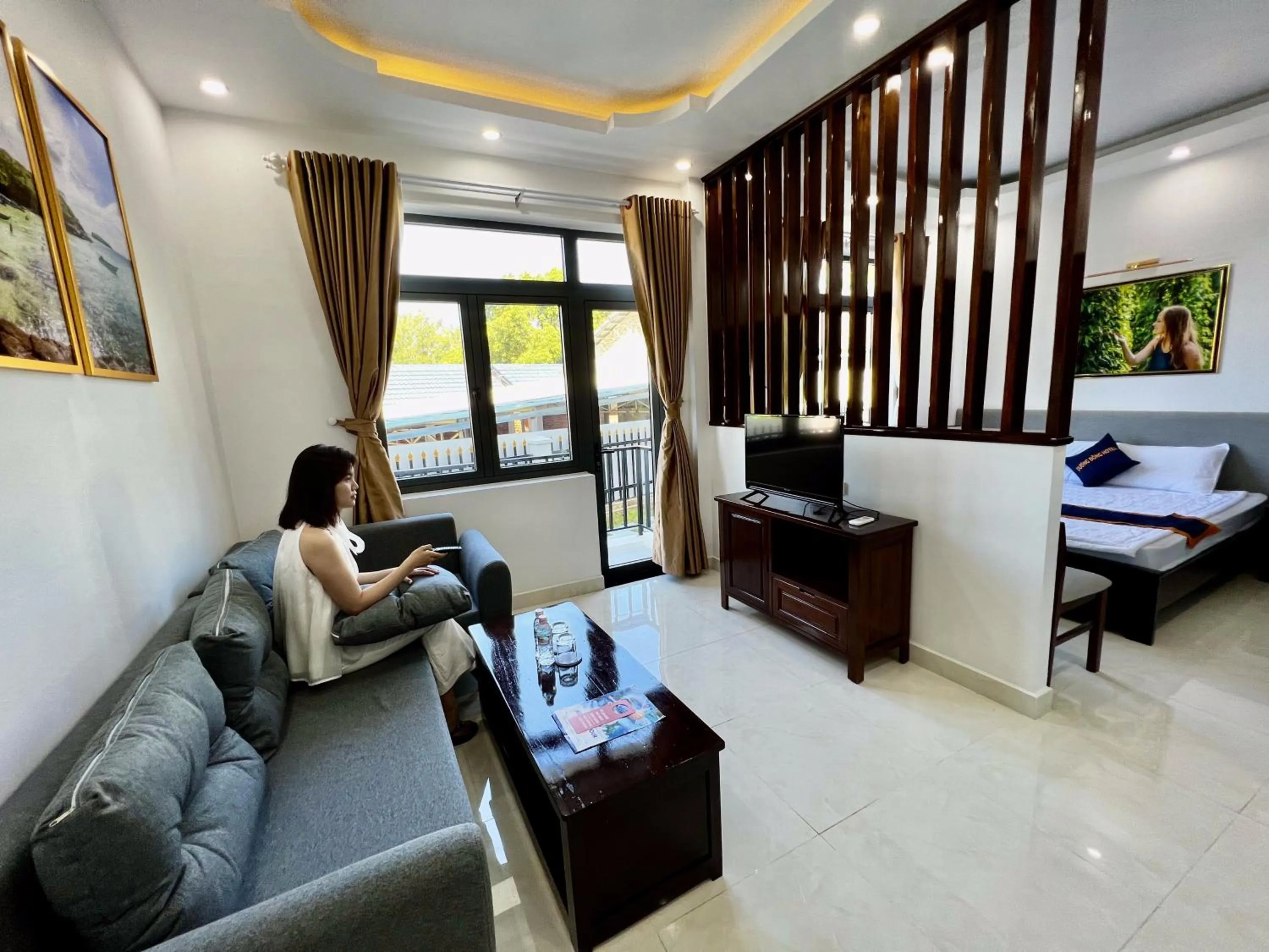 Living room, Bed in Dương Đông Hotel