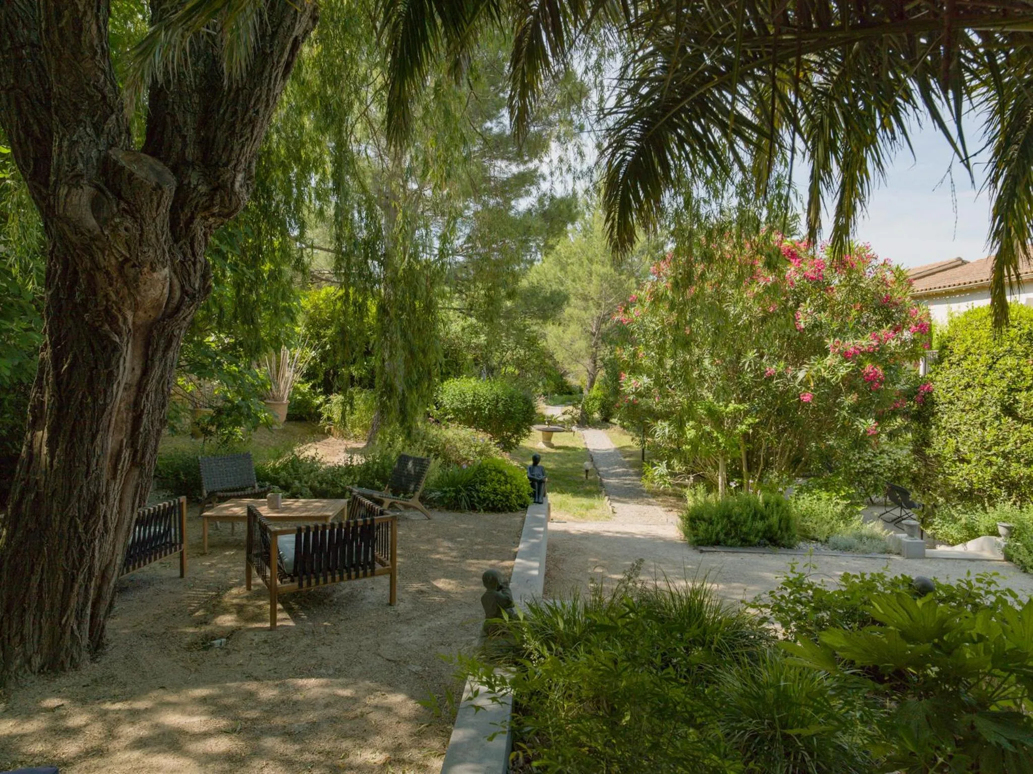 Garden in Hôtel l'Amandière