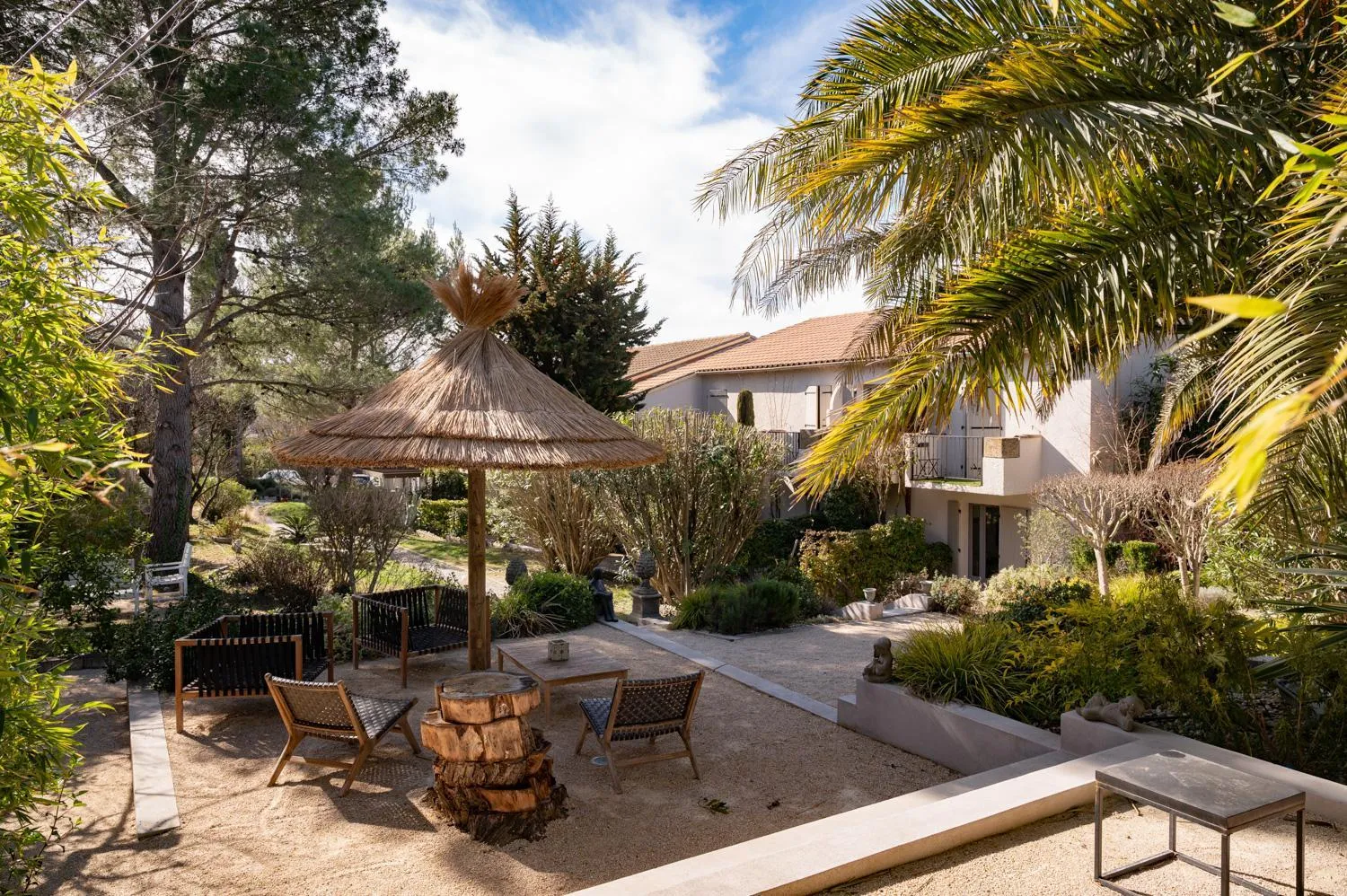 Garden in Hôtel l'Amandière