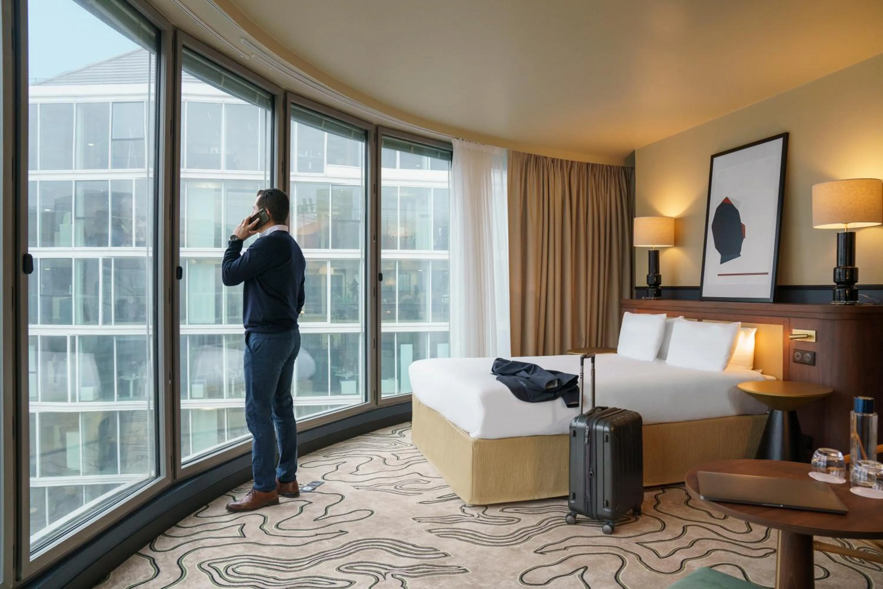 Photo of the whole room, Bed in voco Paris - Porte de Clichy by IHG