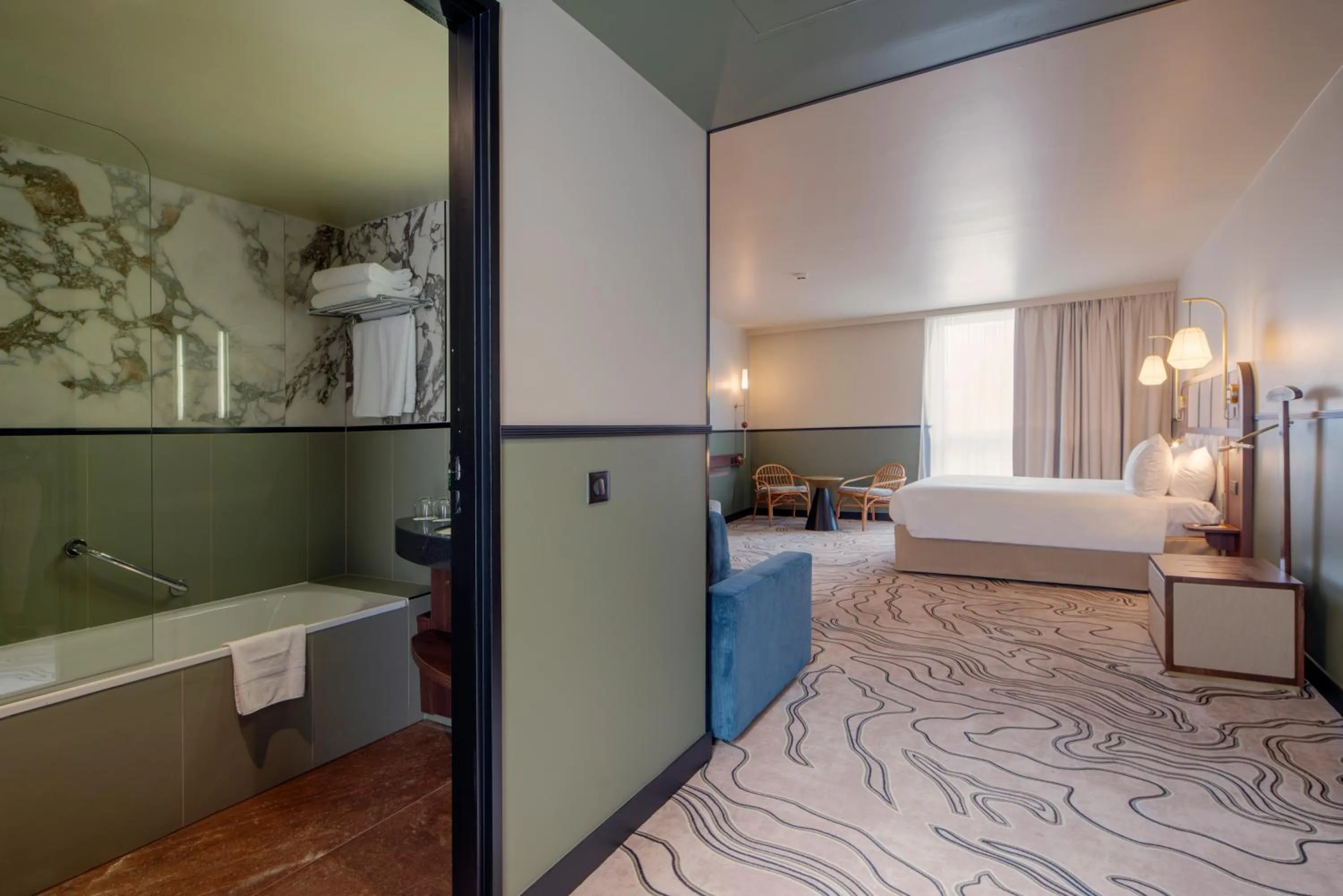 Photo of the whole room, Bed in voco Paris - Porte de Clichy by IHG