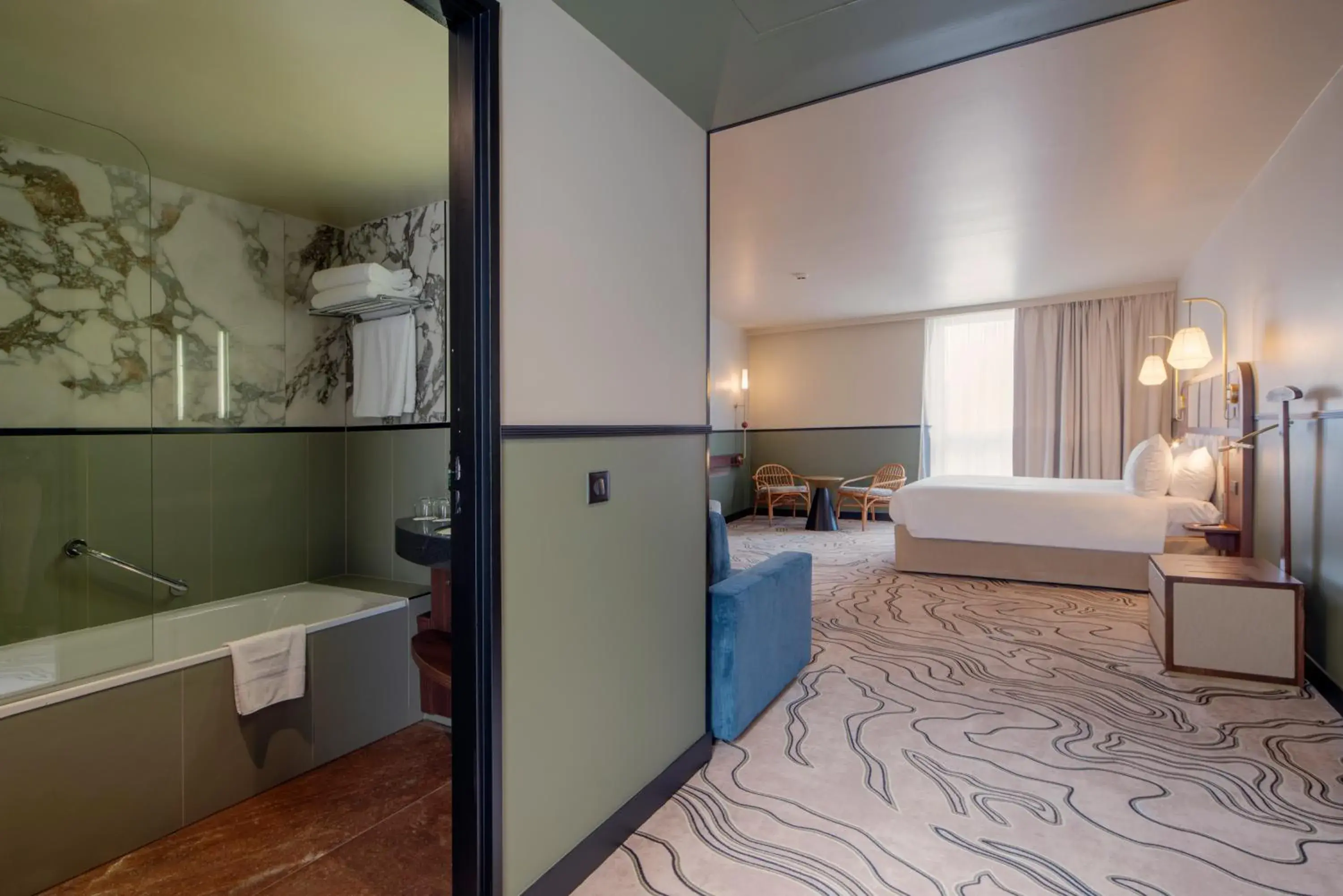 Photo of the whole room, Bed in voco Paris - Porte de Clichy, an IHG Hotel