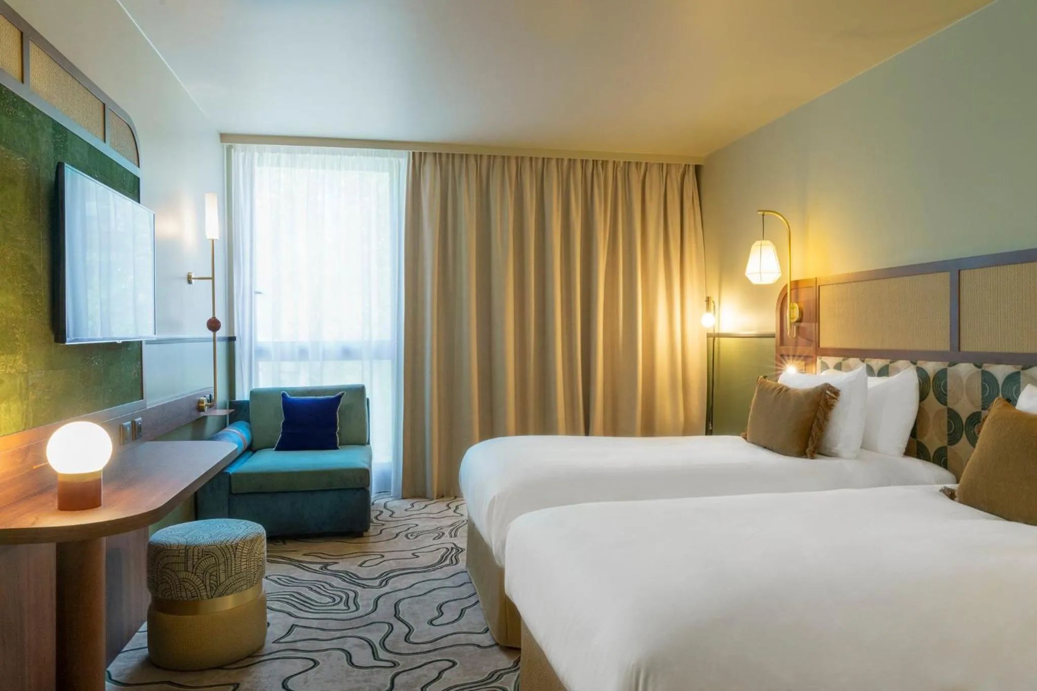 Photo of the whole room, Bed in voco Paris - Porte de Clichy by IHG