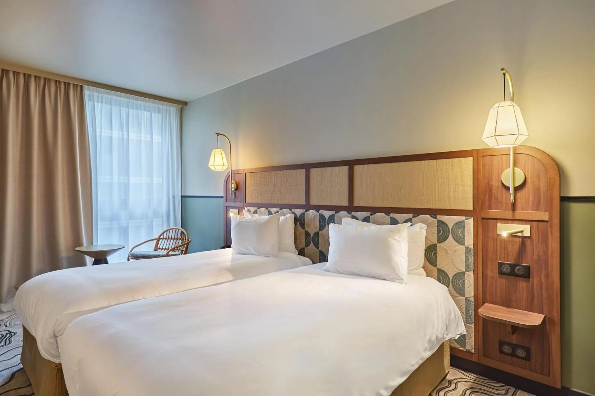 Photo of the whole room, Bed in voco Paris - Porte de Clichy by IHG