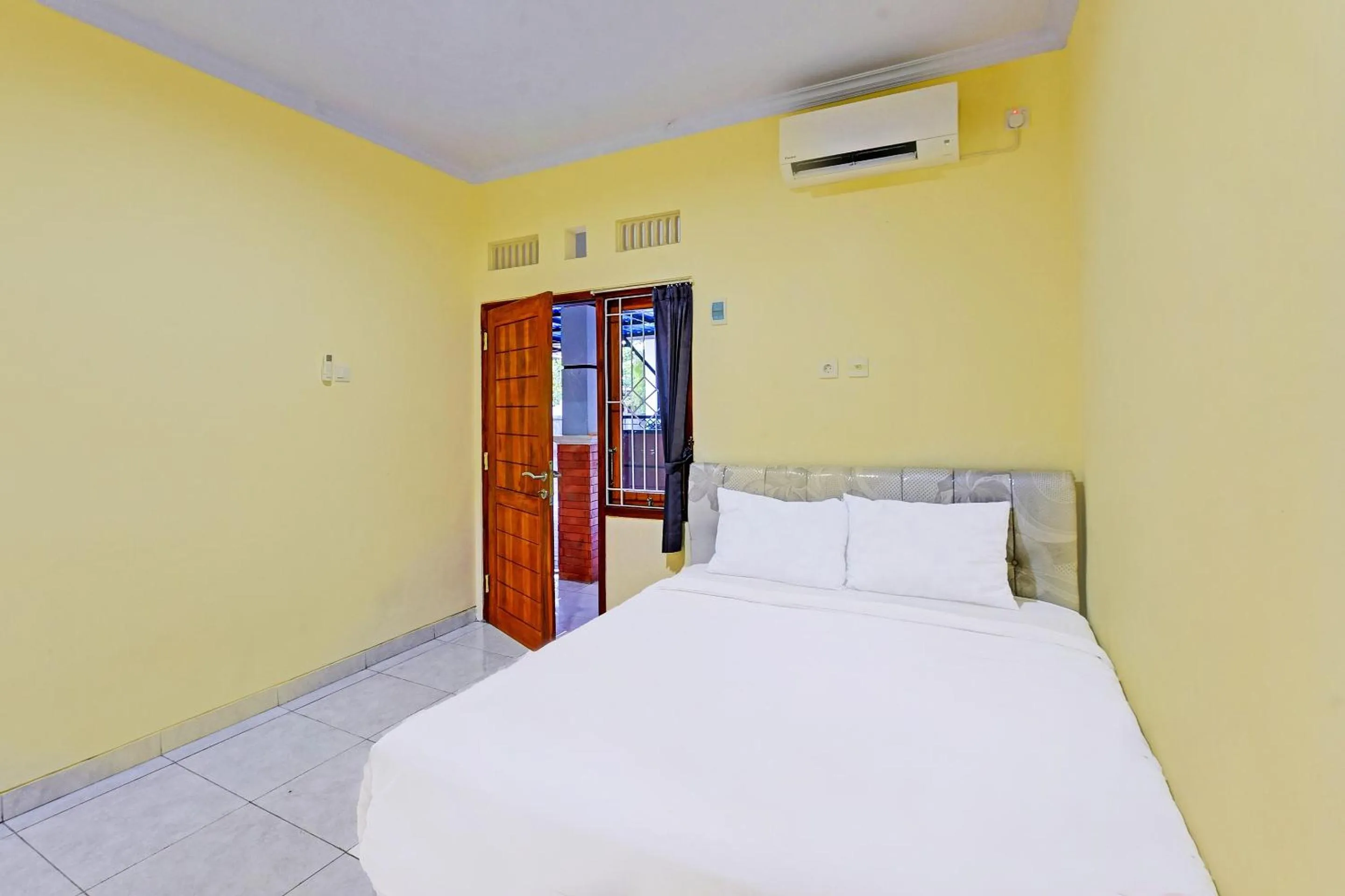 Bedroom in Hotel O Casa Jupiter Shine