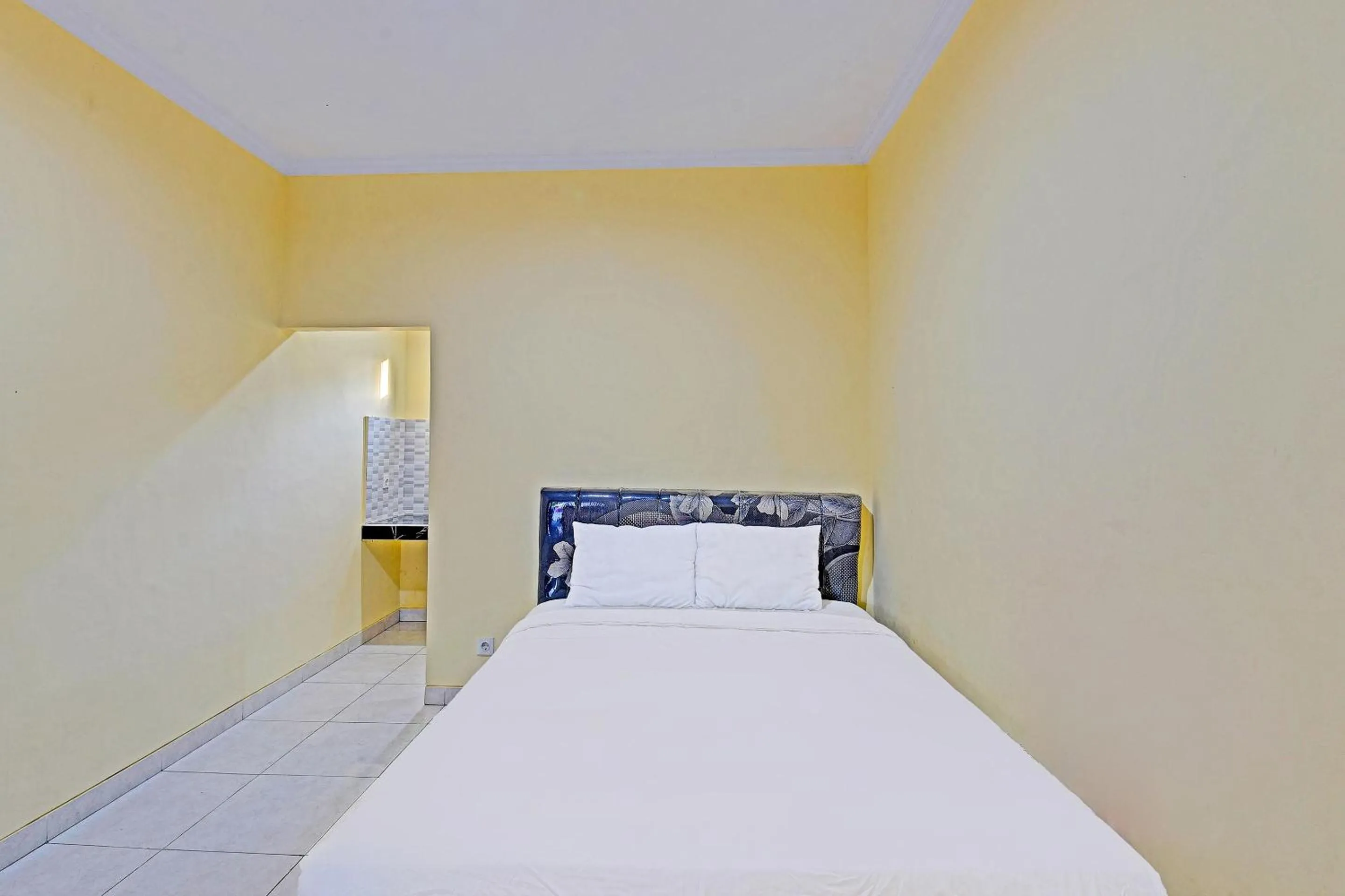 Bedroom in Hotel O Casa Jupiter Shine