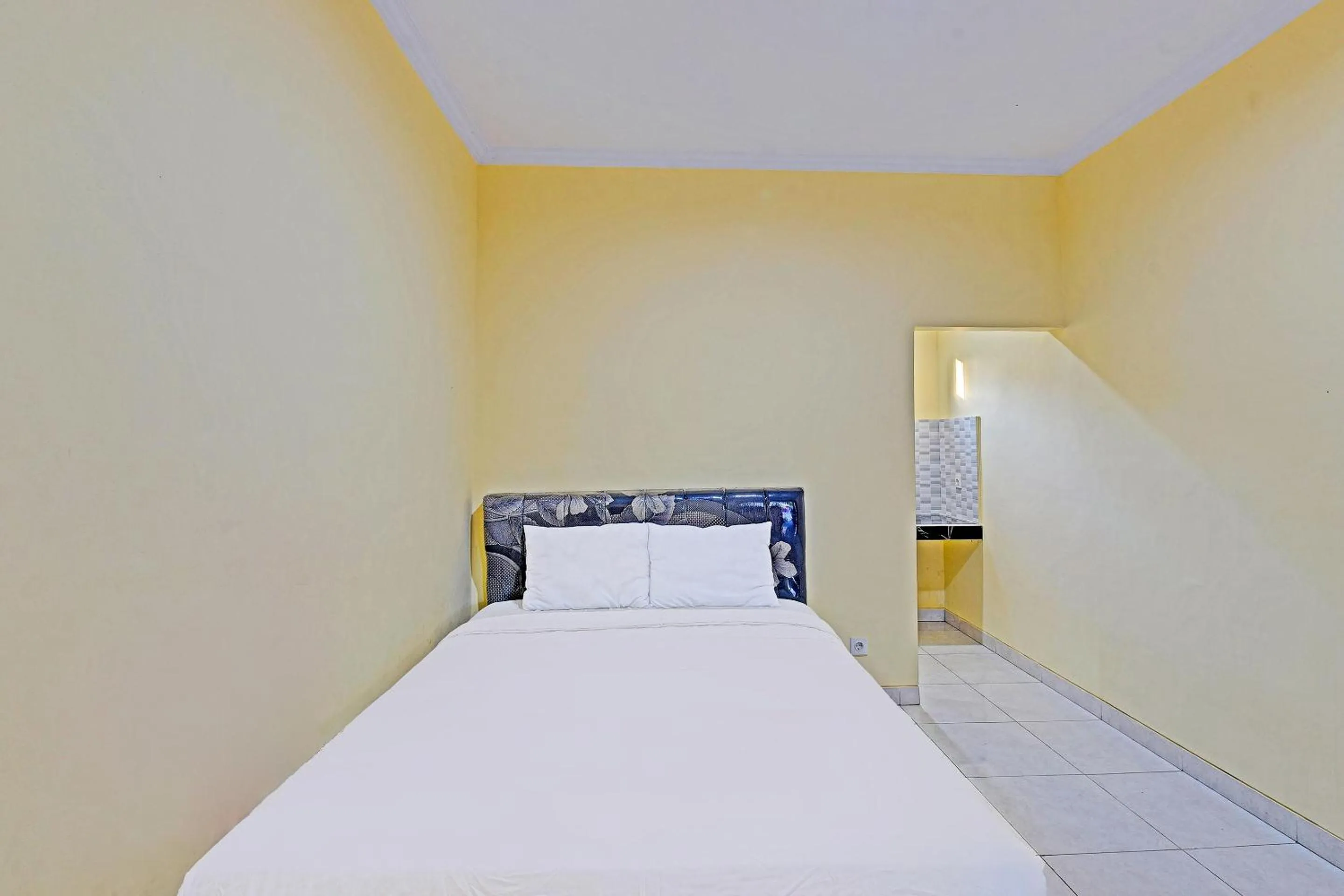 Bedroom in Hotel O Casa Jupiter Shine