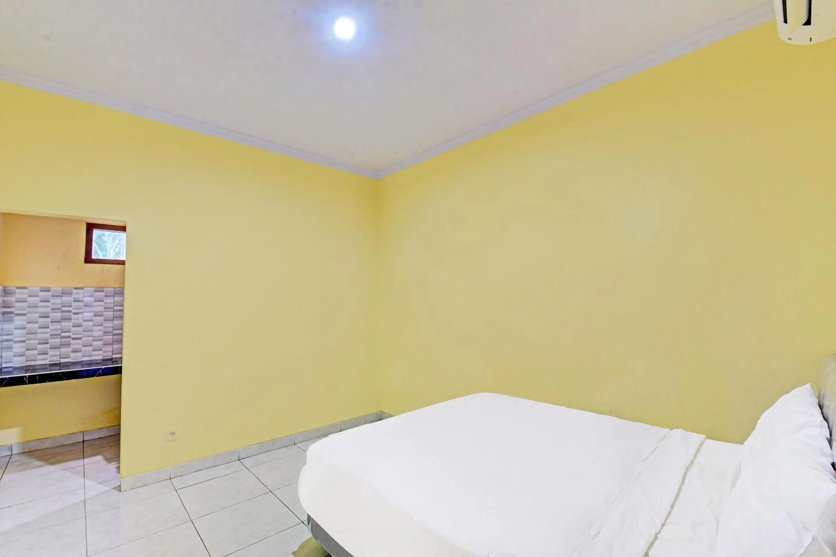 Bedroom in Hotel O Casa Jupiter Shine