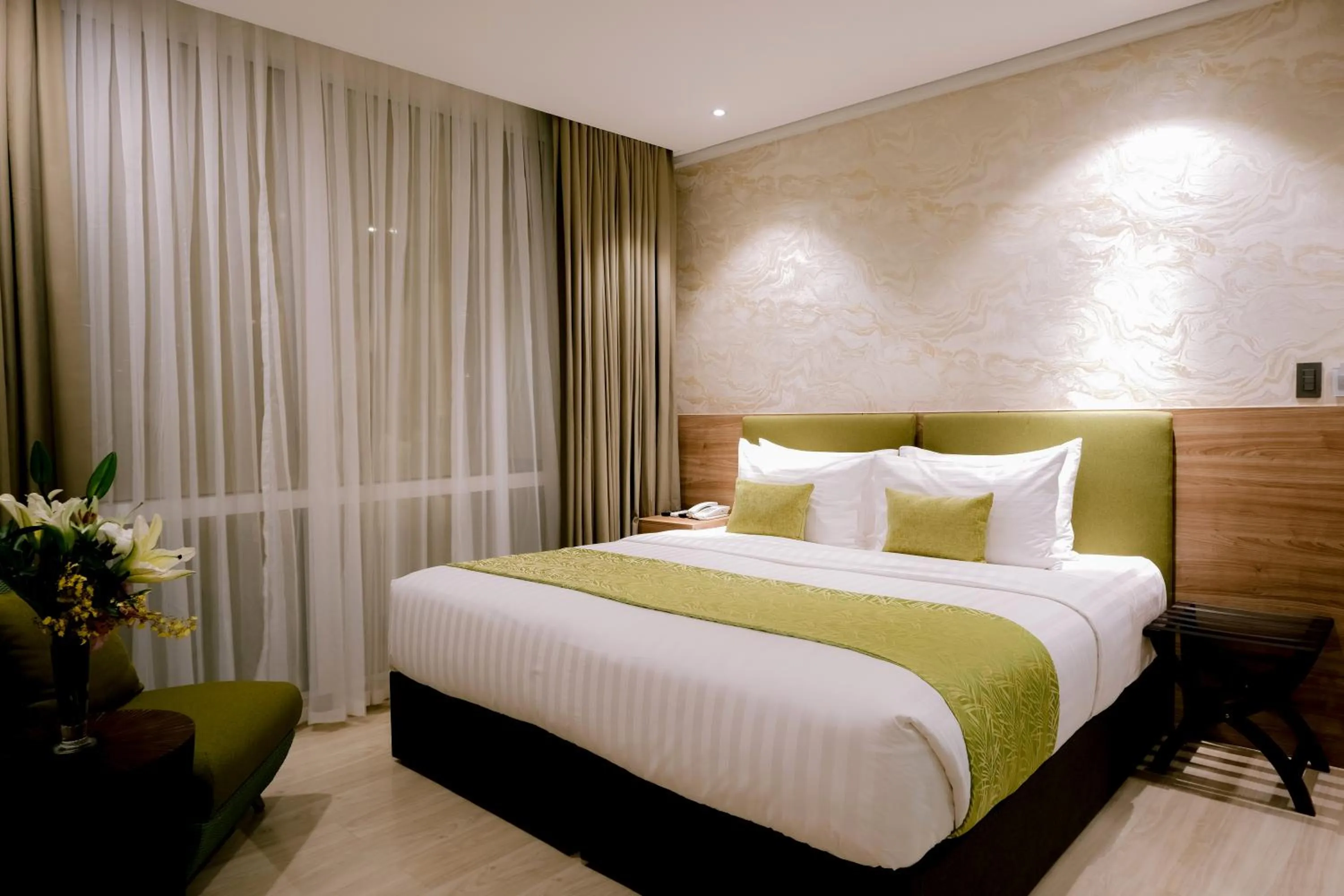 Bed in Goldberry Suites and Hotel Cebu