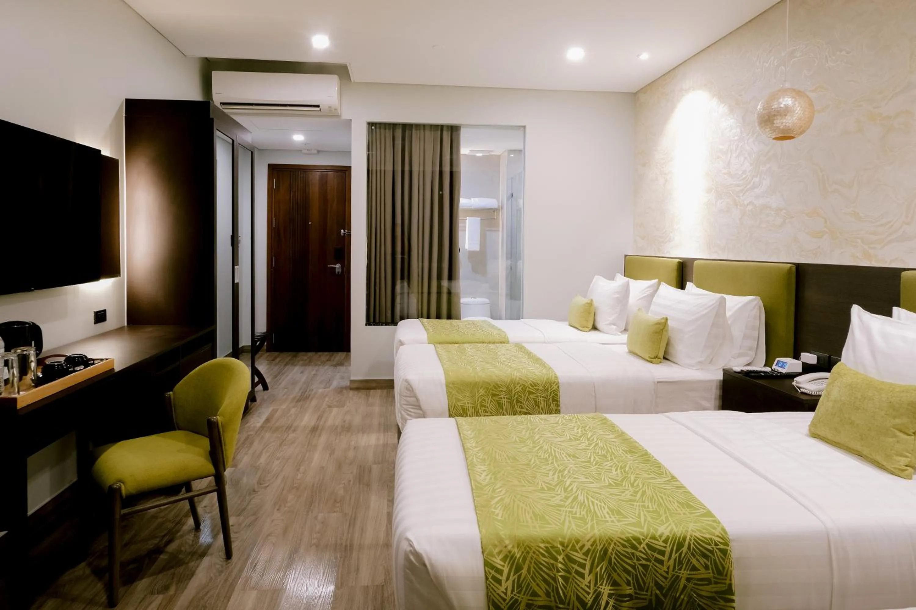 Bed in Goldberry Suites and Hotel Cebu