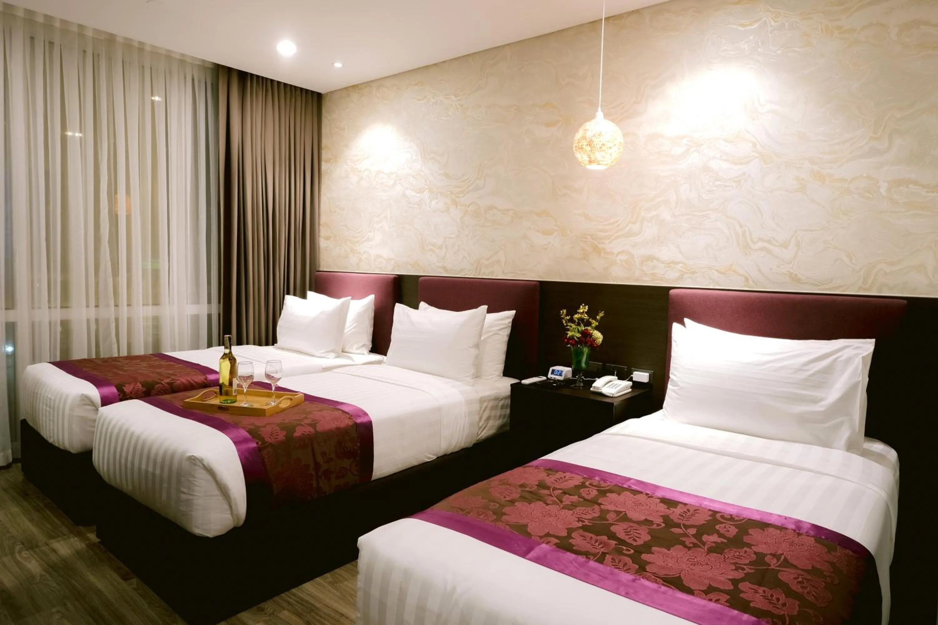 Bed in Goldberry Suites and Hotel Cebu