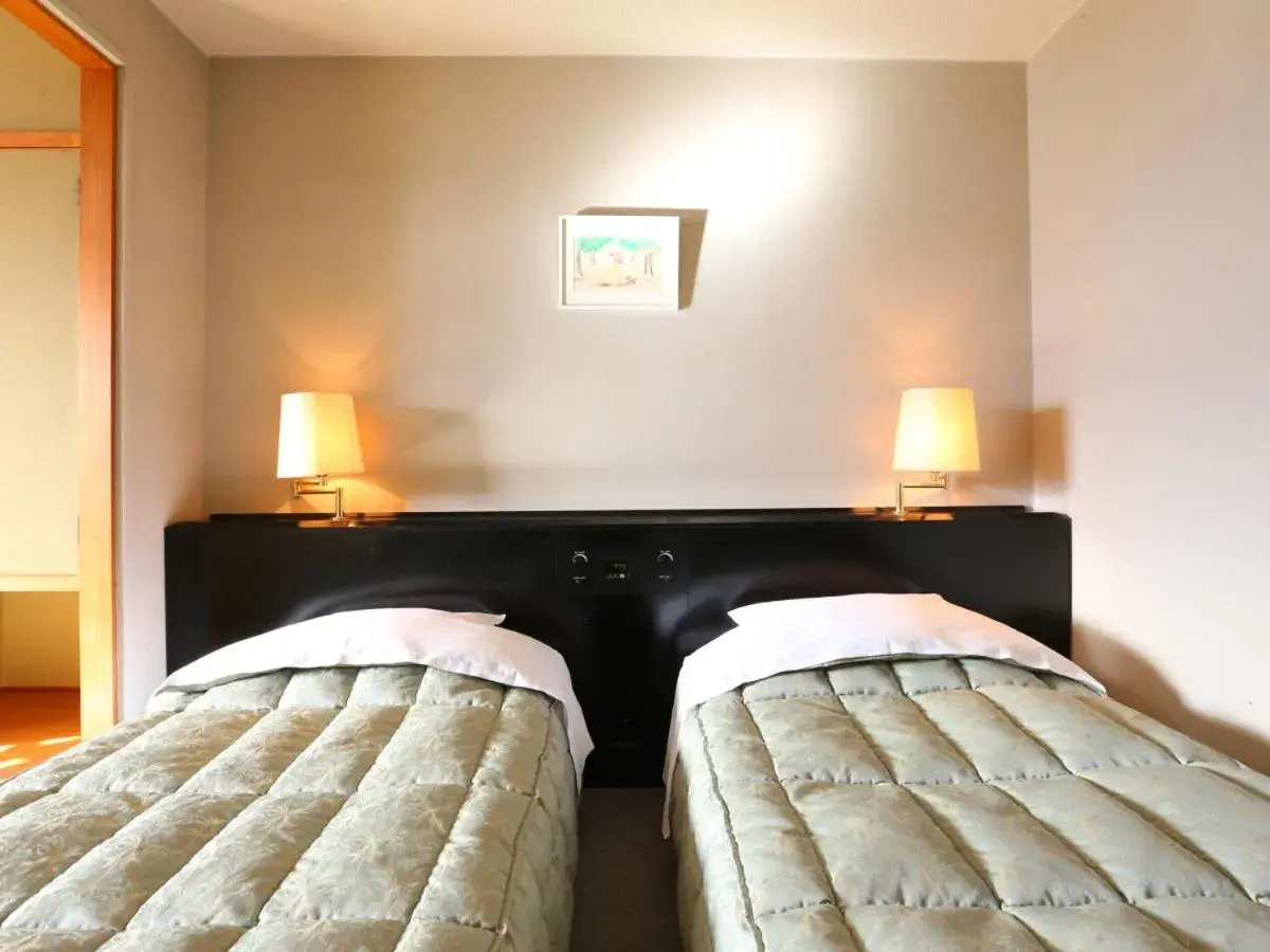 Photo of the whole room, Bed in Hotel Silk Inn Madarao Photo of the whole room, Bed in Hotel Silk Inn Madarao