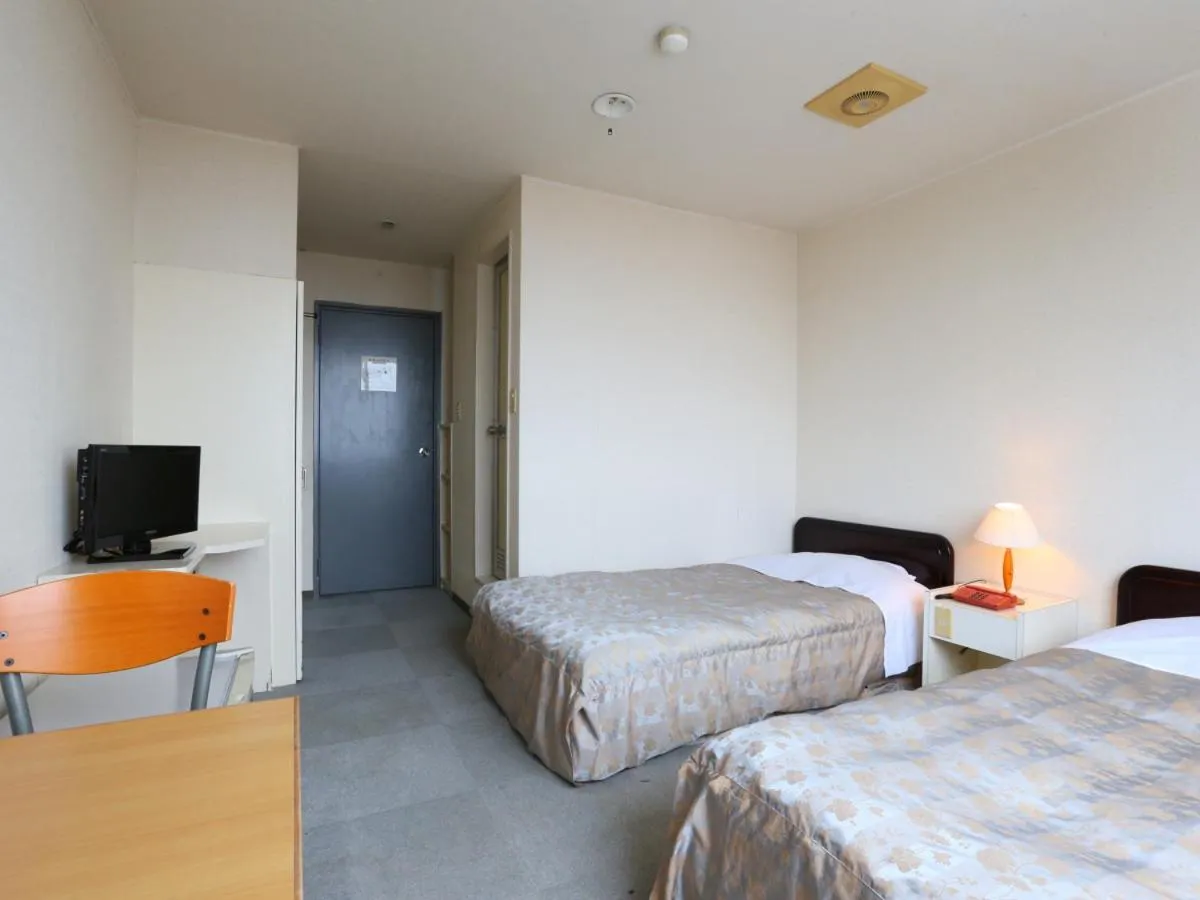 Photo of the whole room, Bed in Hotel Silk Inn Madarao