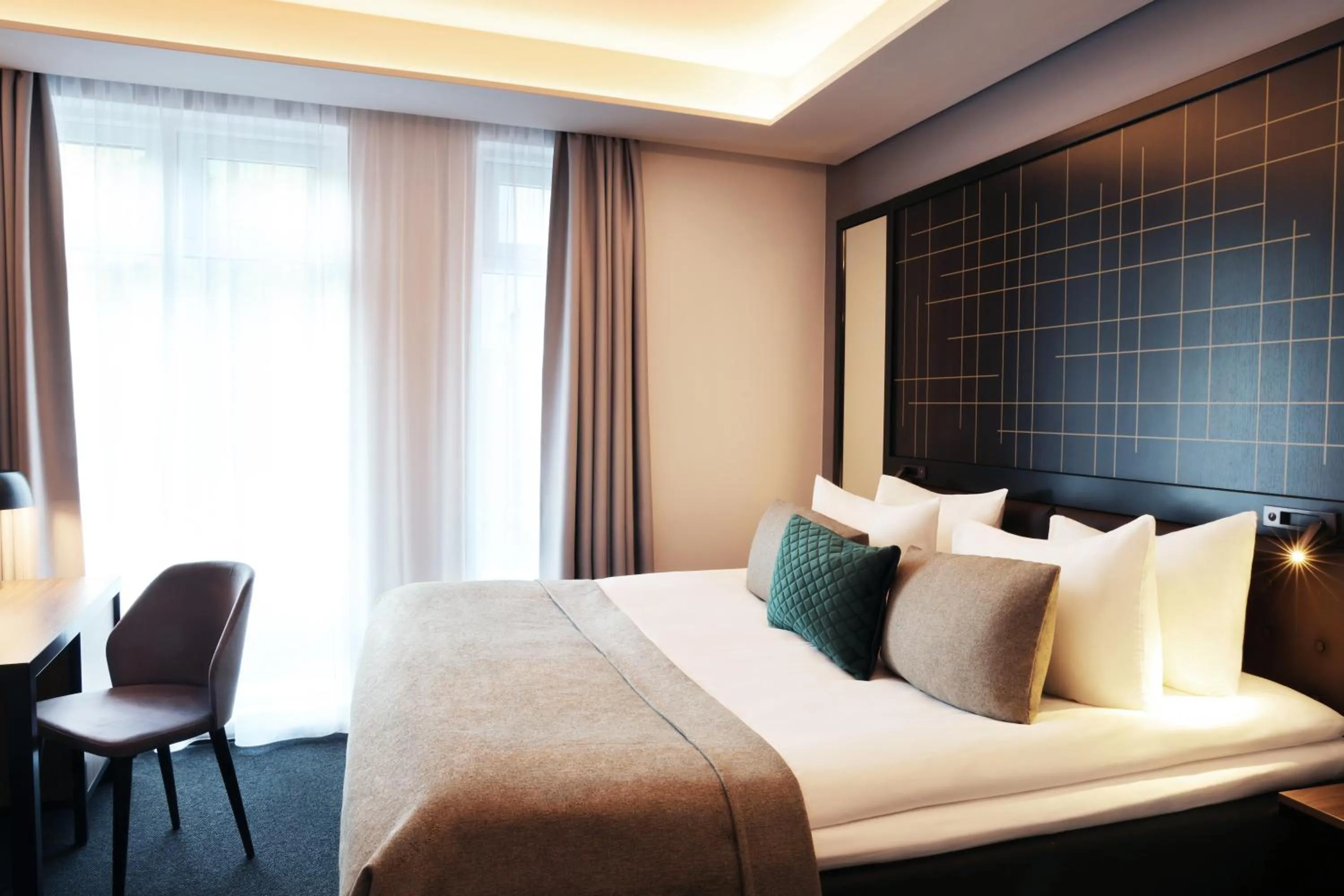 Bed in Hotel Reykjavík Saga