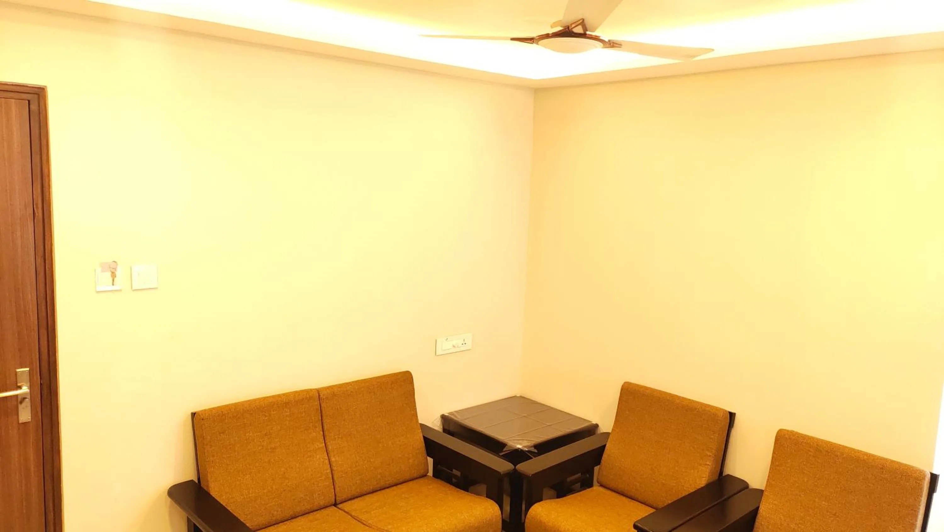 Seating area in Hotel Rhythm Grand Suite