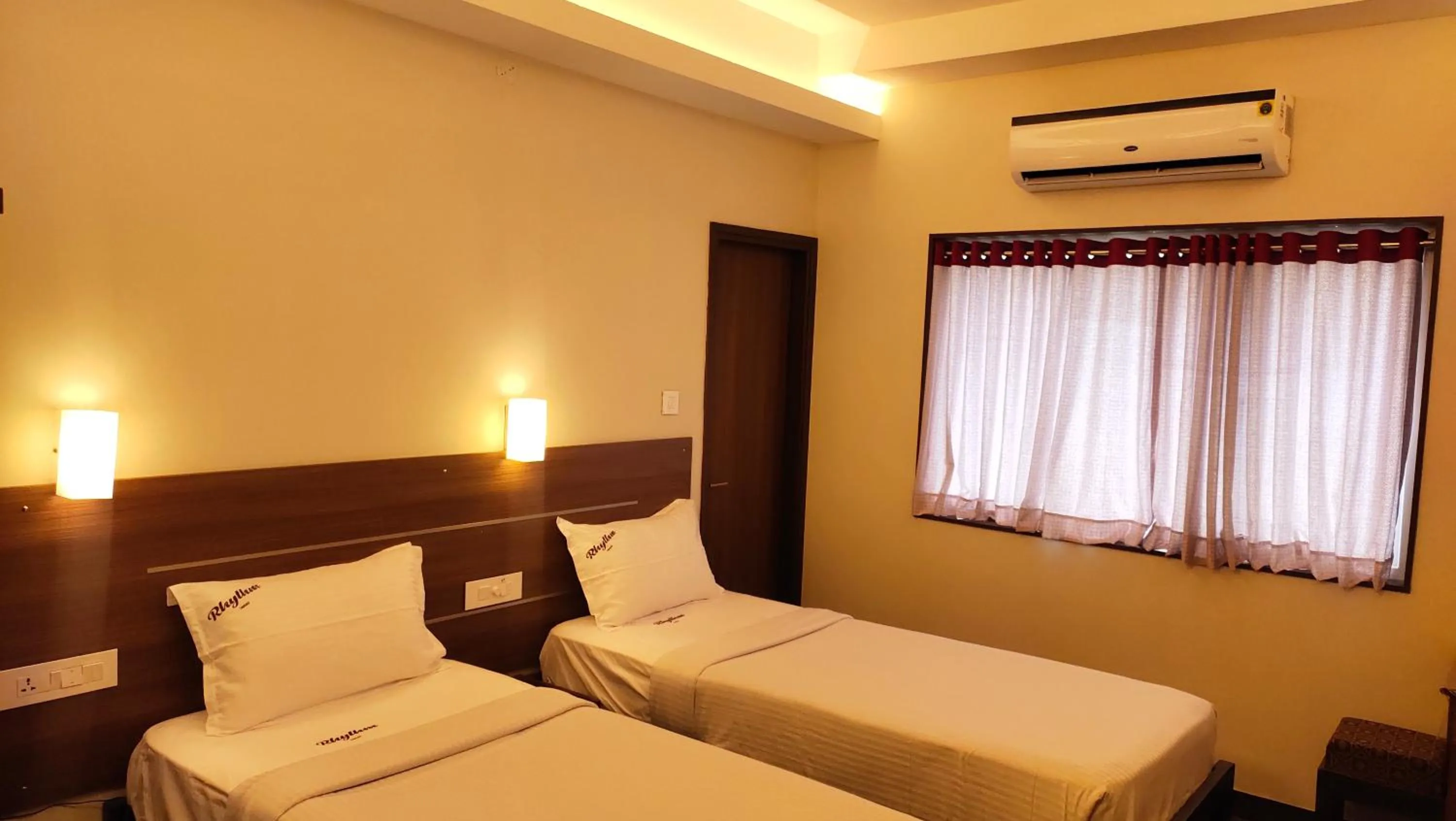 Bed in Hotel Rhythm Grand Suite