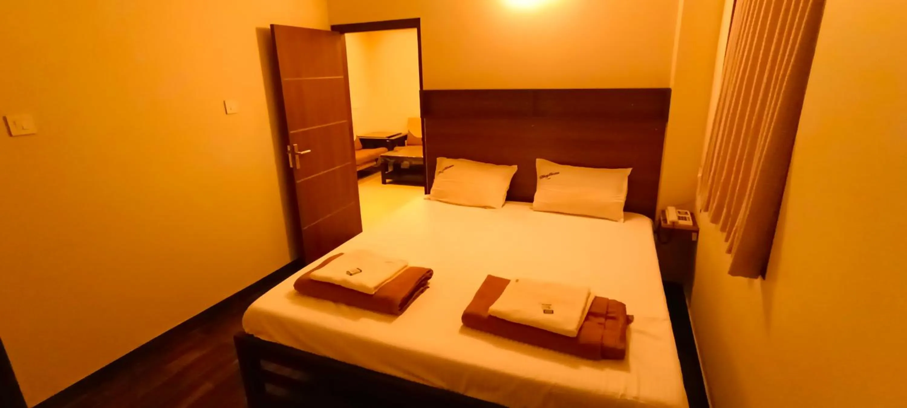 Bed in Hotel Rhythm Grand Suite