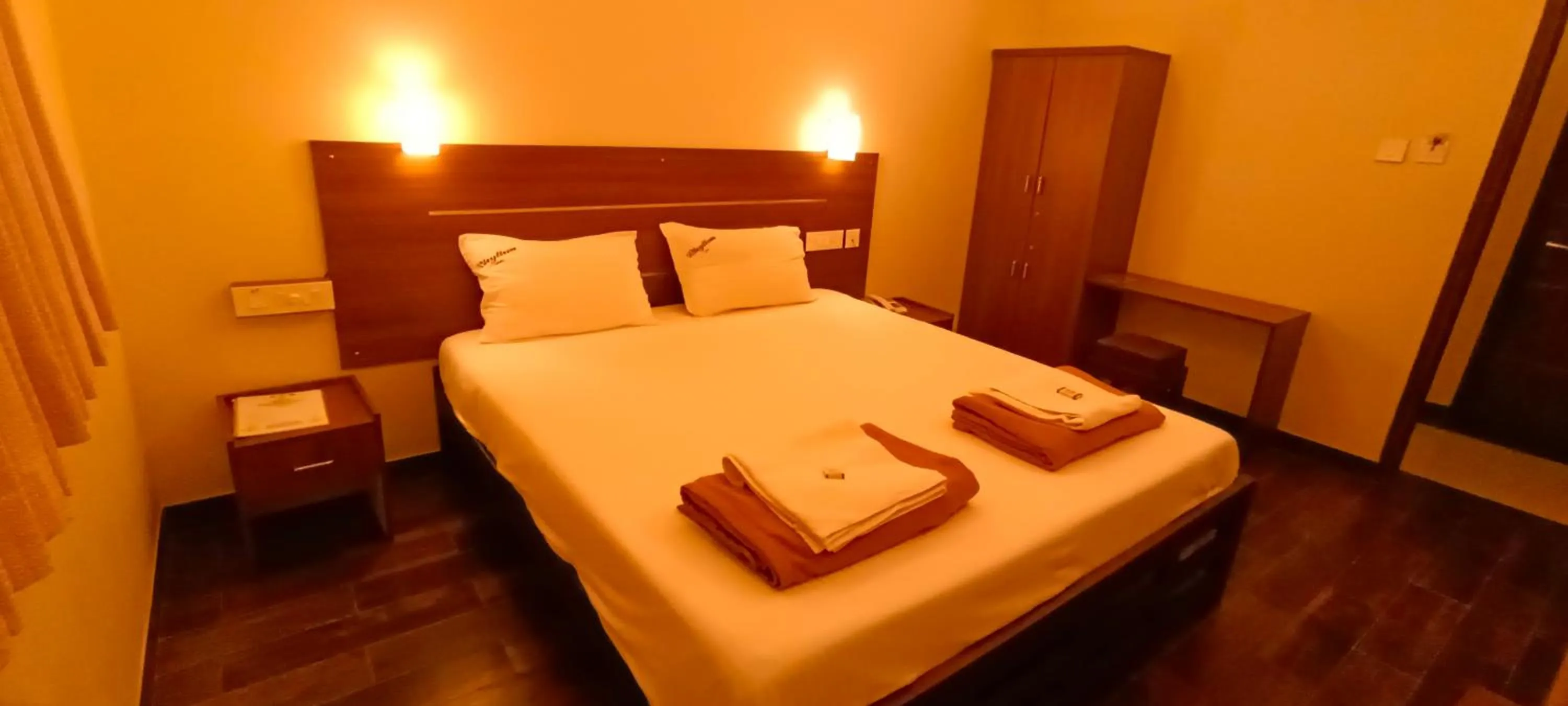 Bed in Hotel Rhythm Grand Suite