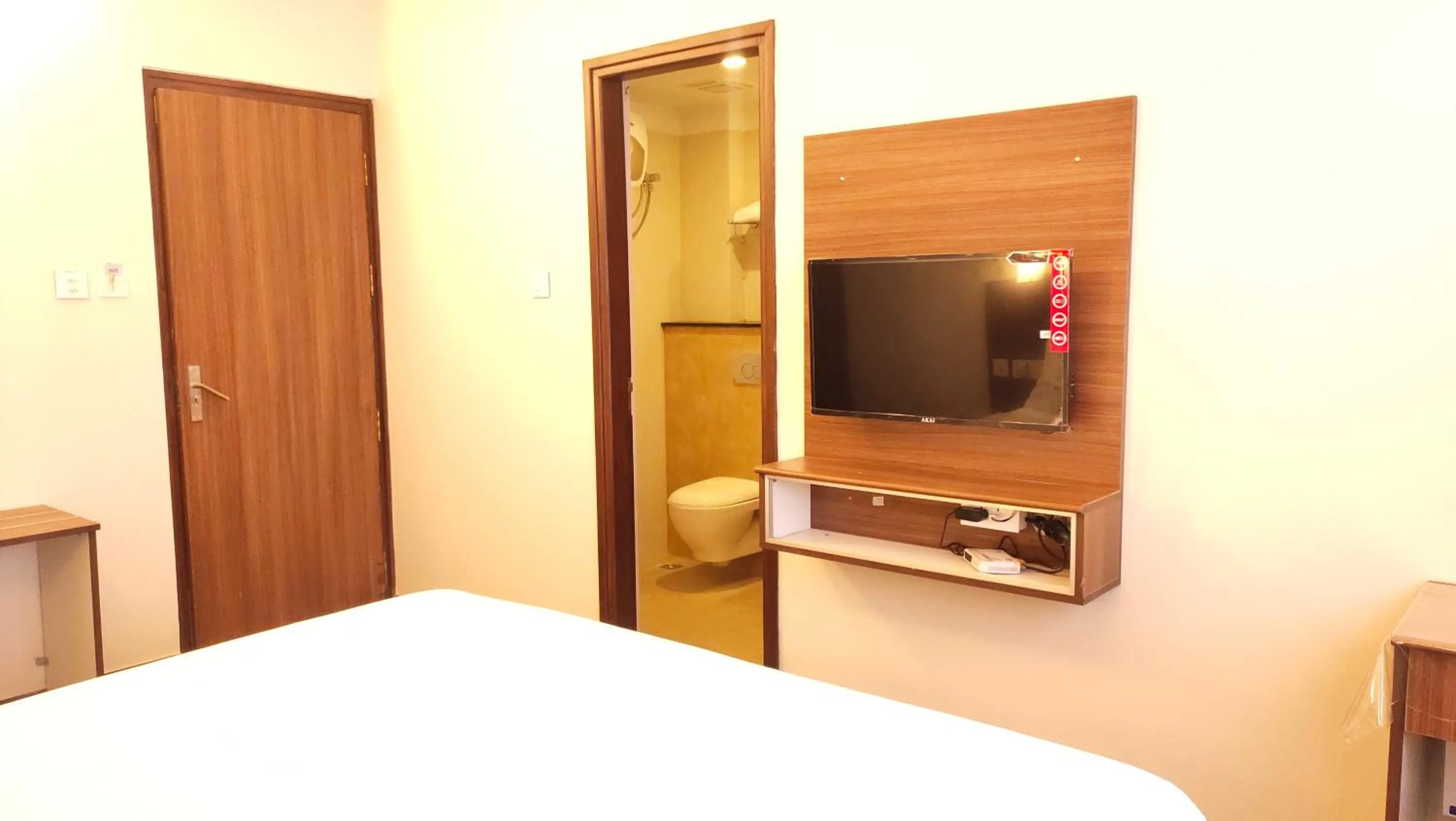 Bed in Hotel Rhythm Grand Suite