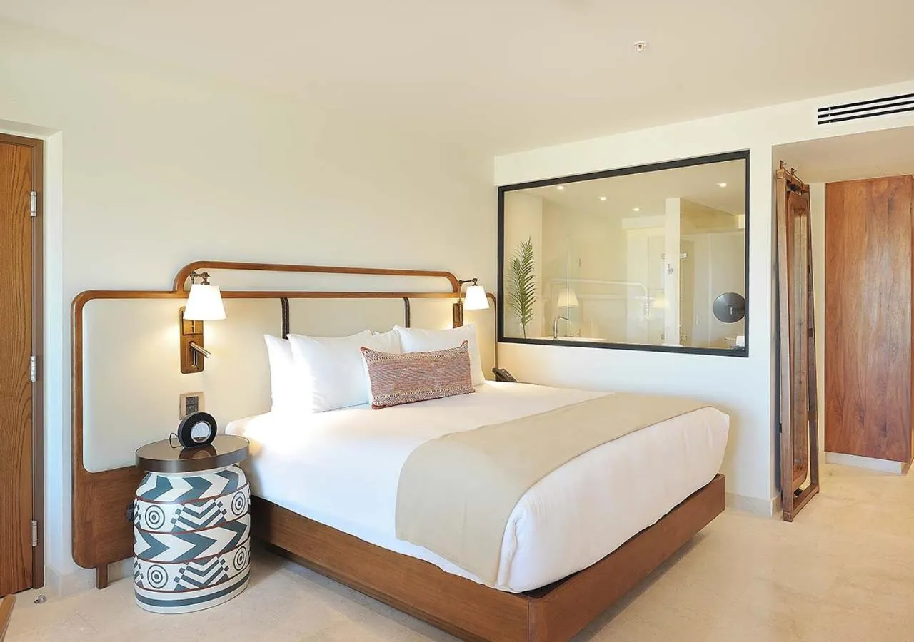 Bed in Corazón Cabo, a Noble House Resort