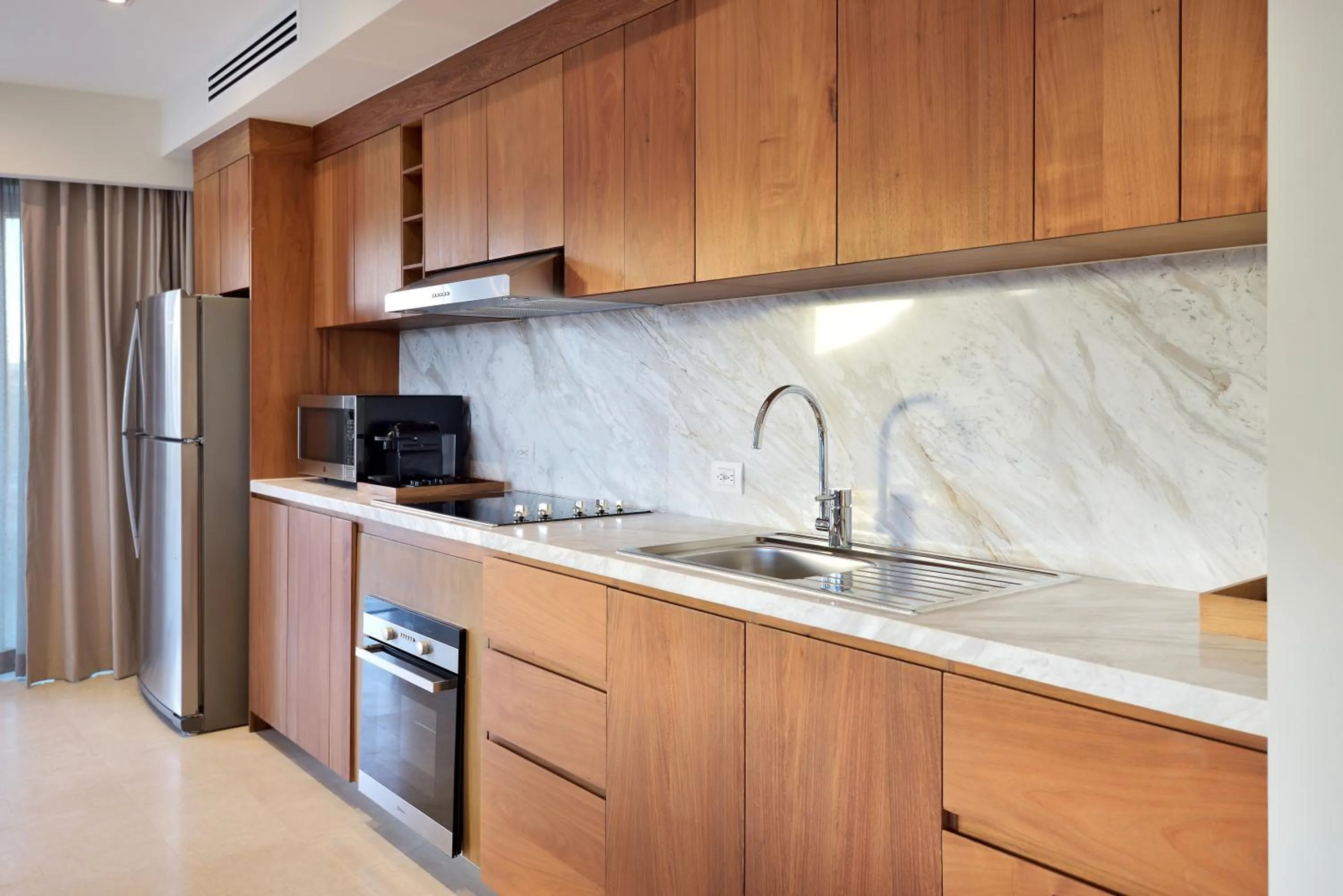 Kitchen or kitchenette in Corazón Cabo, a Noble House Resort