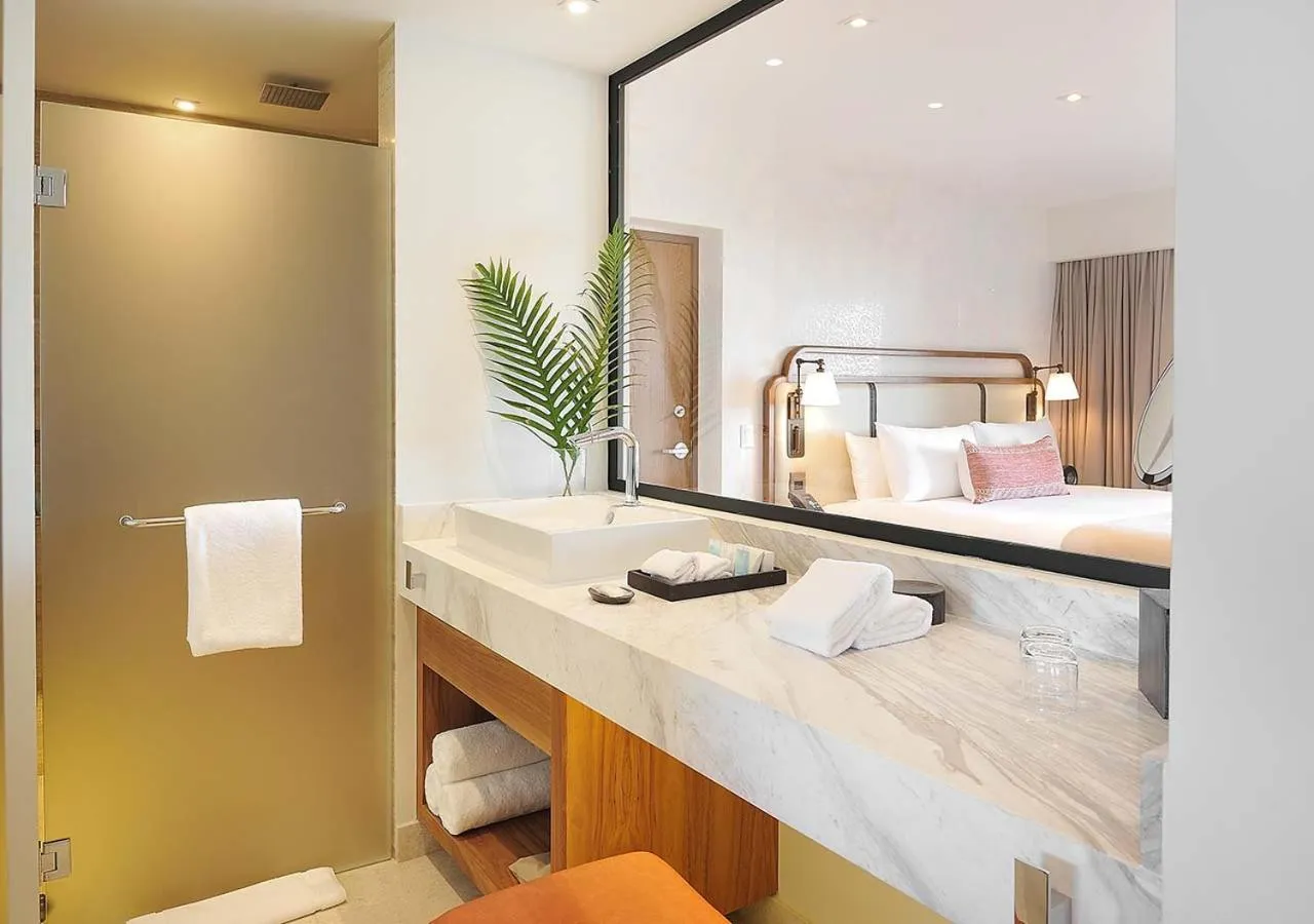 Bathroom, Bed in Corazón Cabo, a Noble House Resort