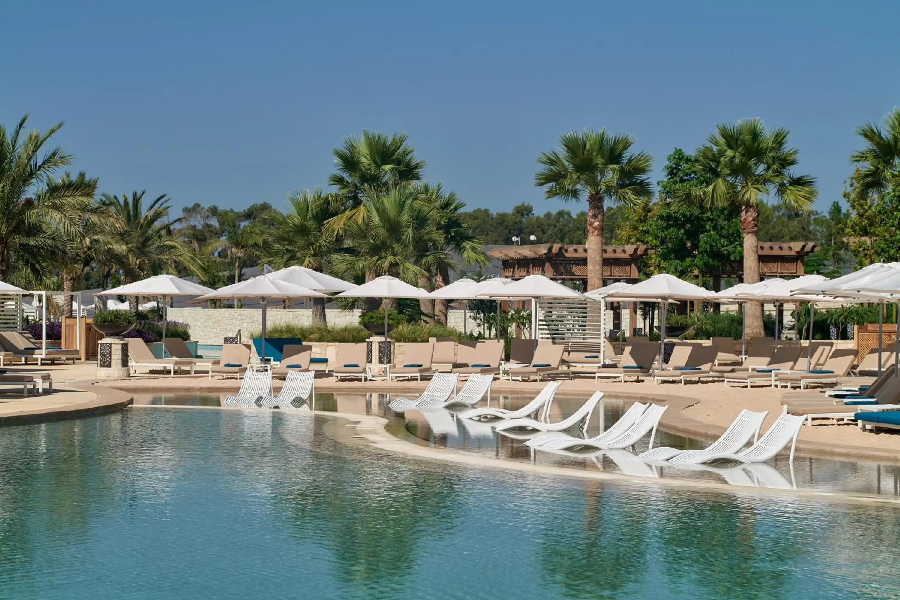 Swimming pool in City of Dreams Mediterranean - Integrated Resort, Casino & Entertainment Swimming pool in City of Dreams Mediterranean - Integrated Resort, Casino & Entertainment