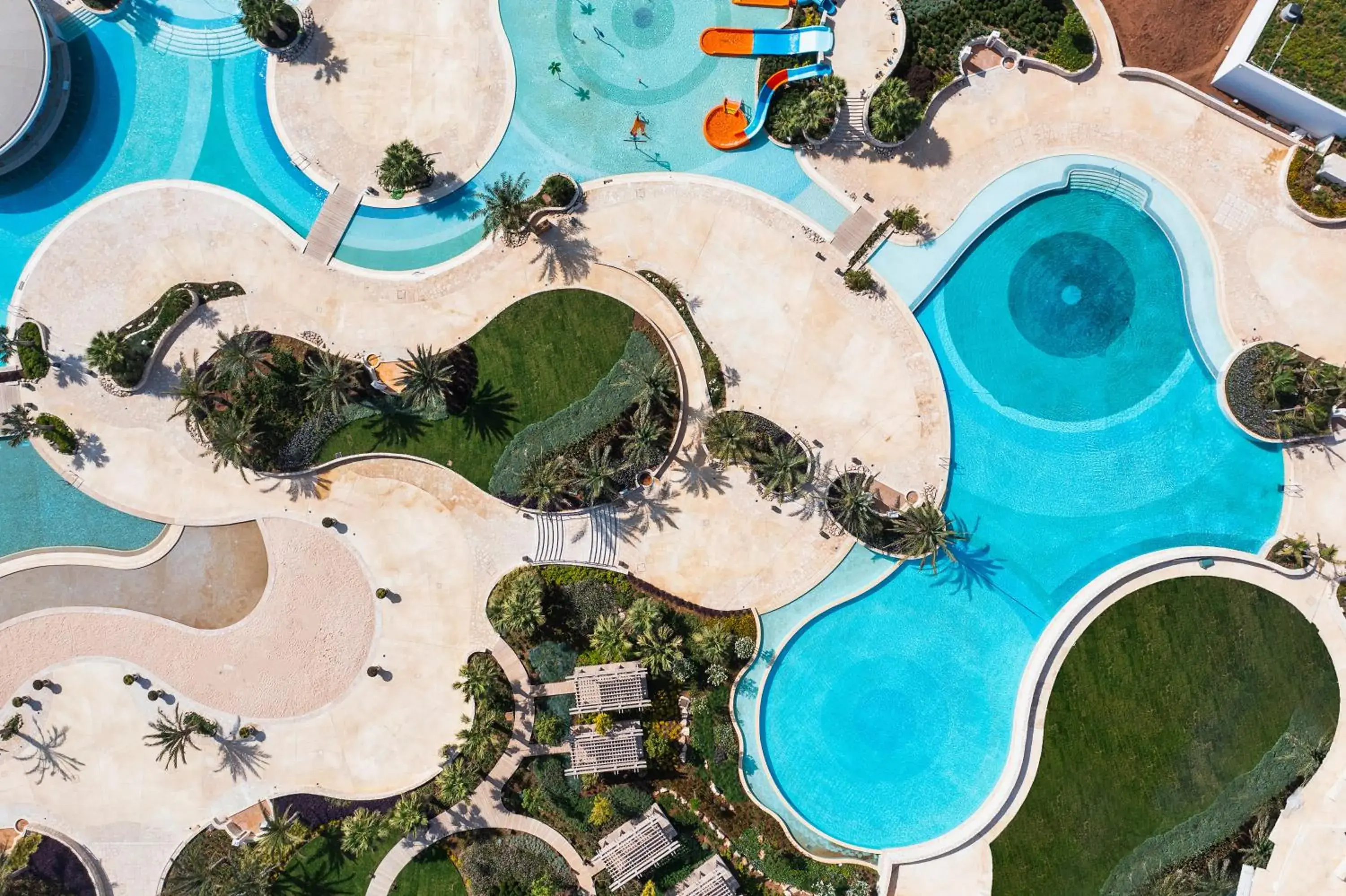 Swimming pool in City of Dreams Mediterranean - Integrated Resort, Casino & Entertainment Swimming pool in City of Dreams Mediterranean - Integrated Resort, Casino & Entertainment