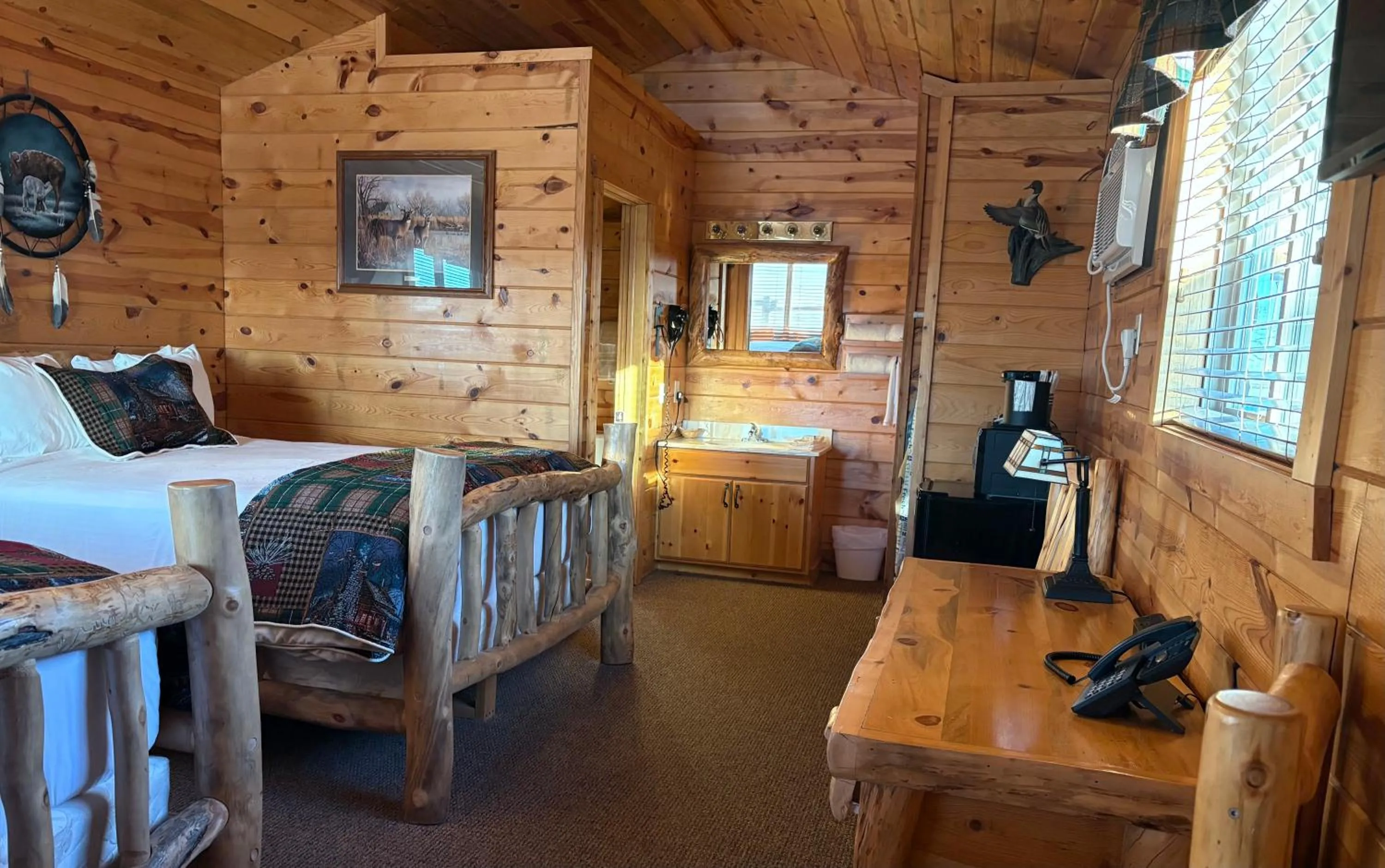 Bed in Badlands Frontier Cabins